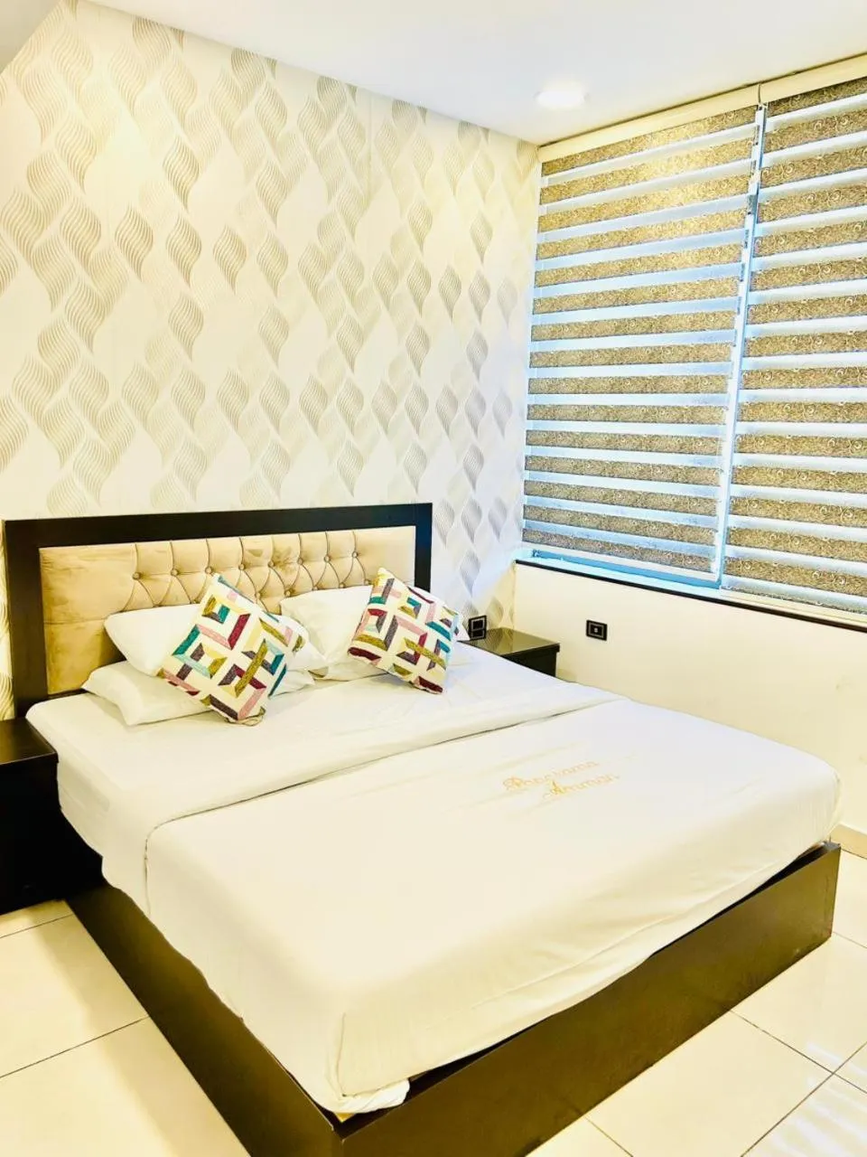 Bed in Panorama Amman Hotel