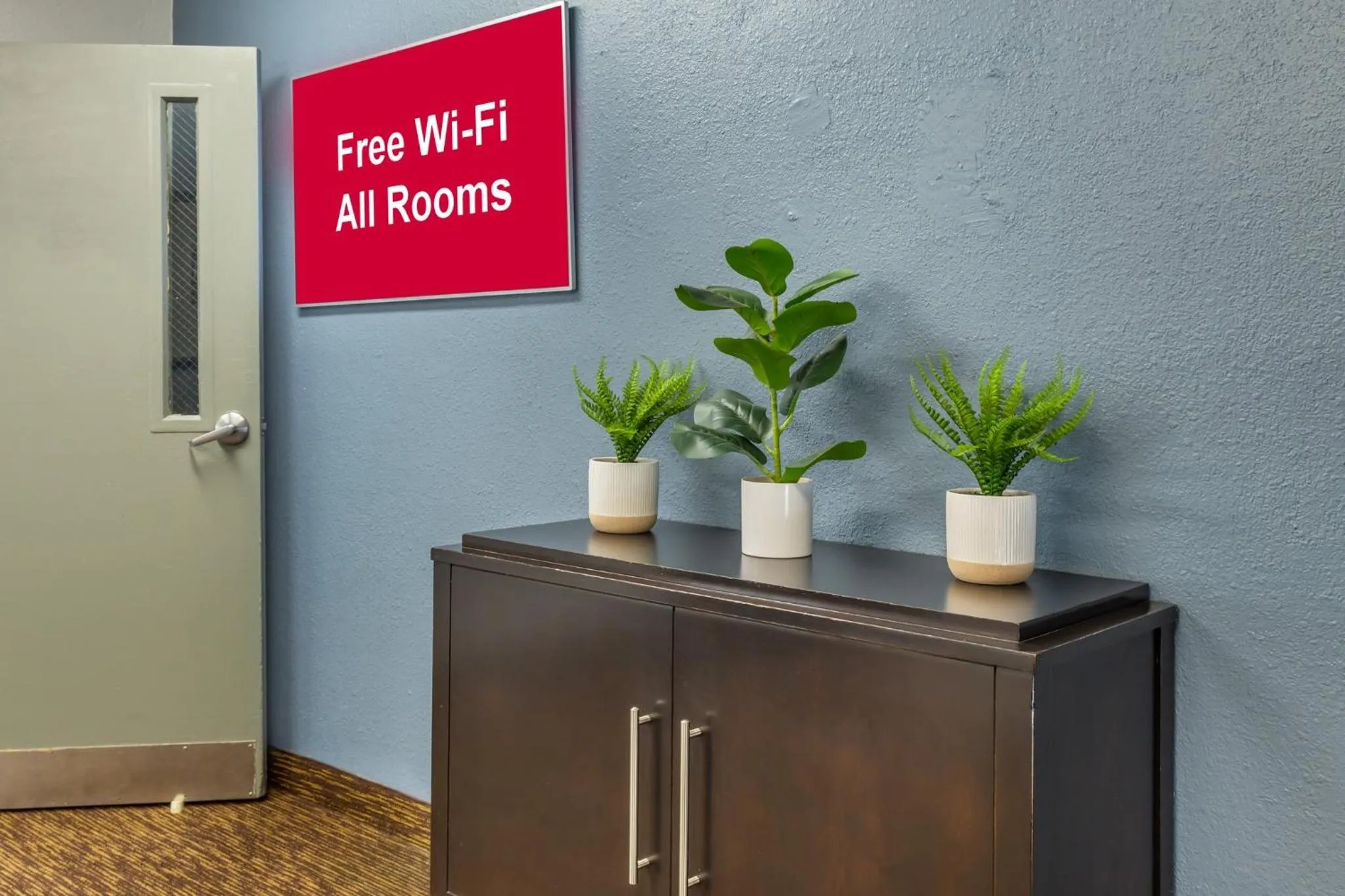 Lobby or reception in HomeTowne Studios & Suites by Red Roof Greensboro