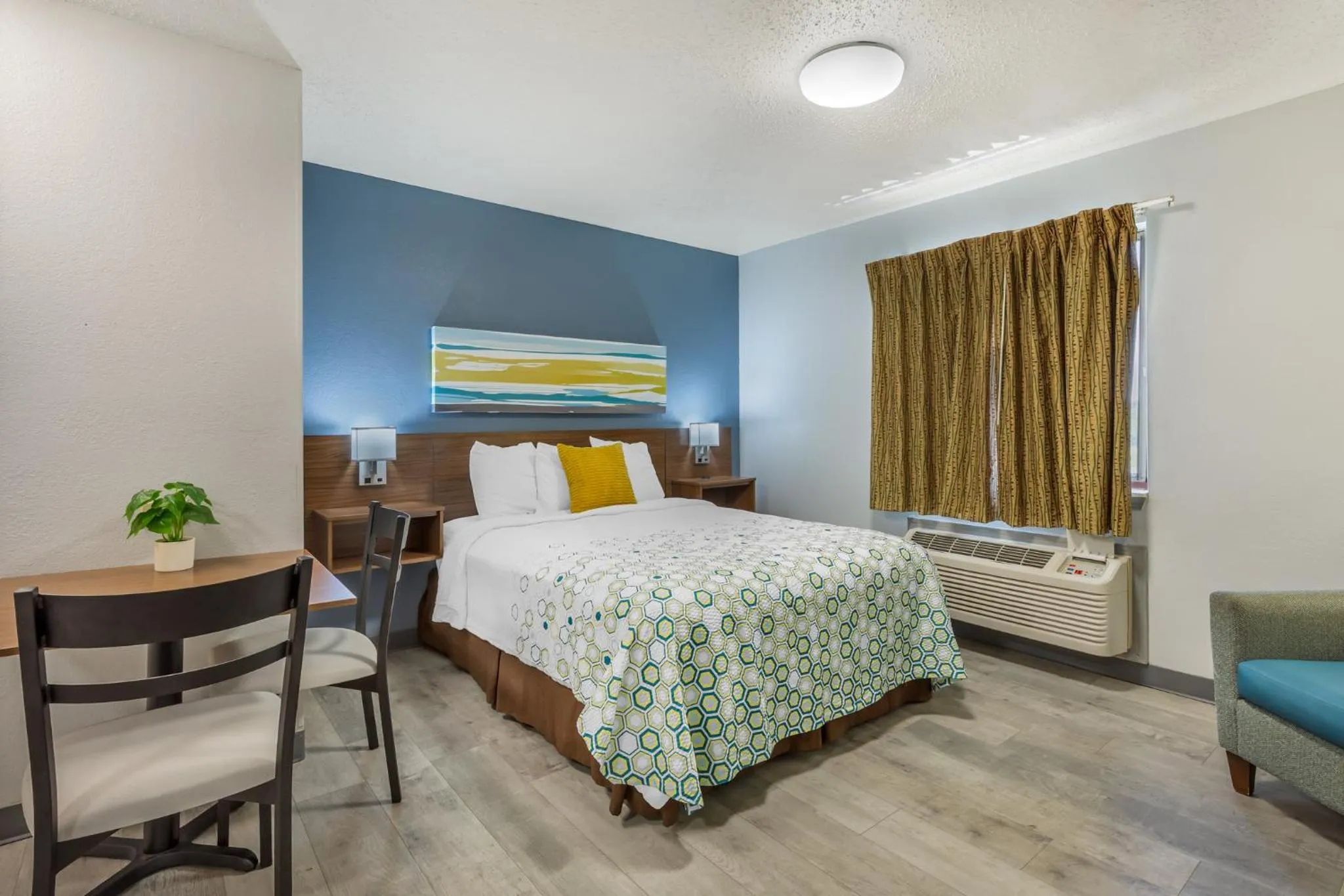 Photo of the whole room, Bed in HomeTowne Studios & Suites by Red Roof Greensboro