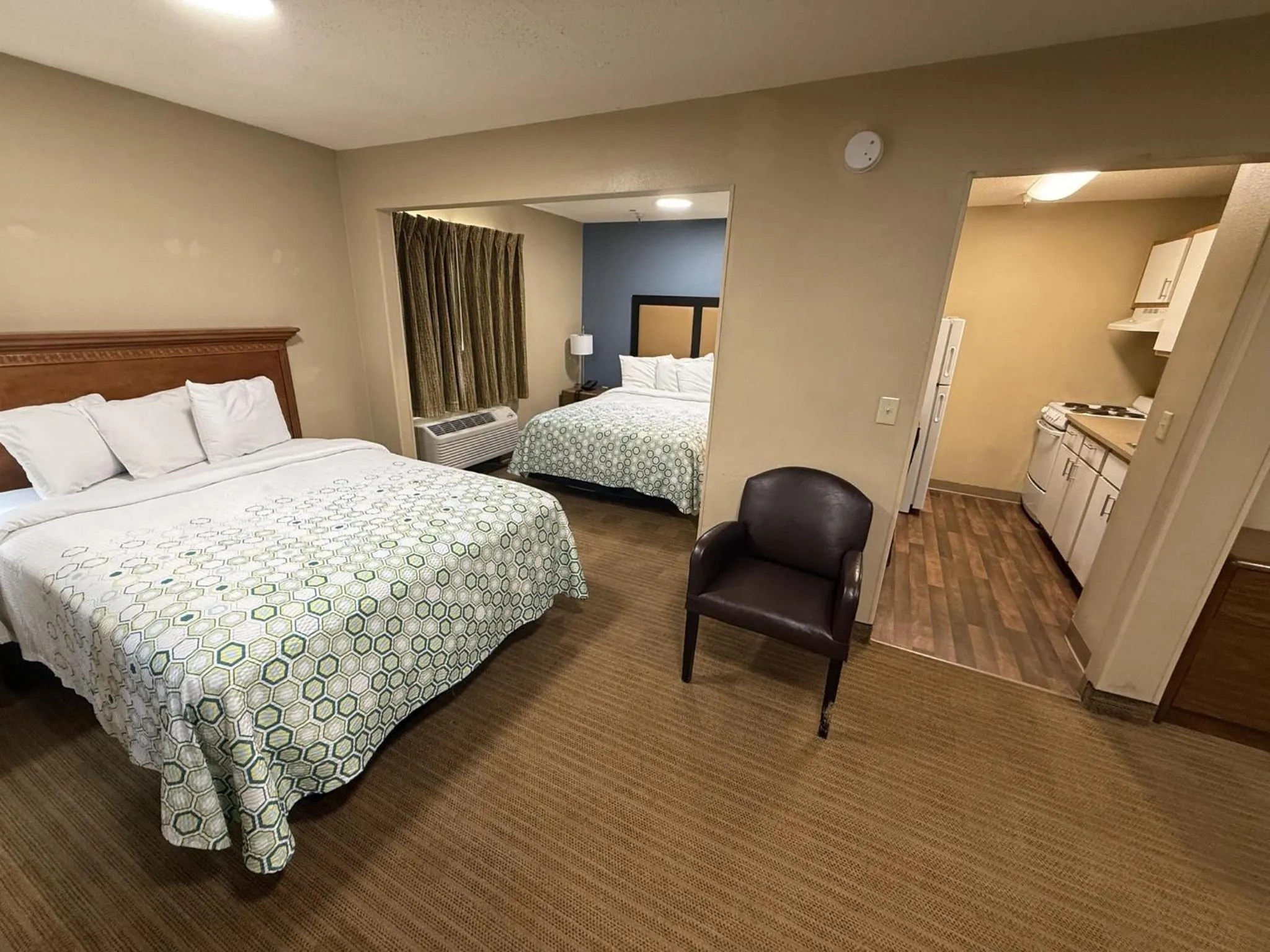Bedroom, Bed in HomeTowne Studios & Suites by Red Roof Greensboro