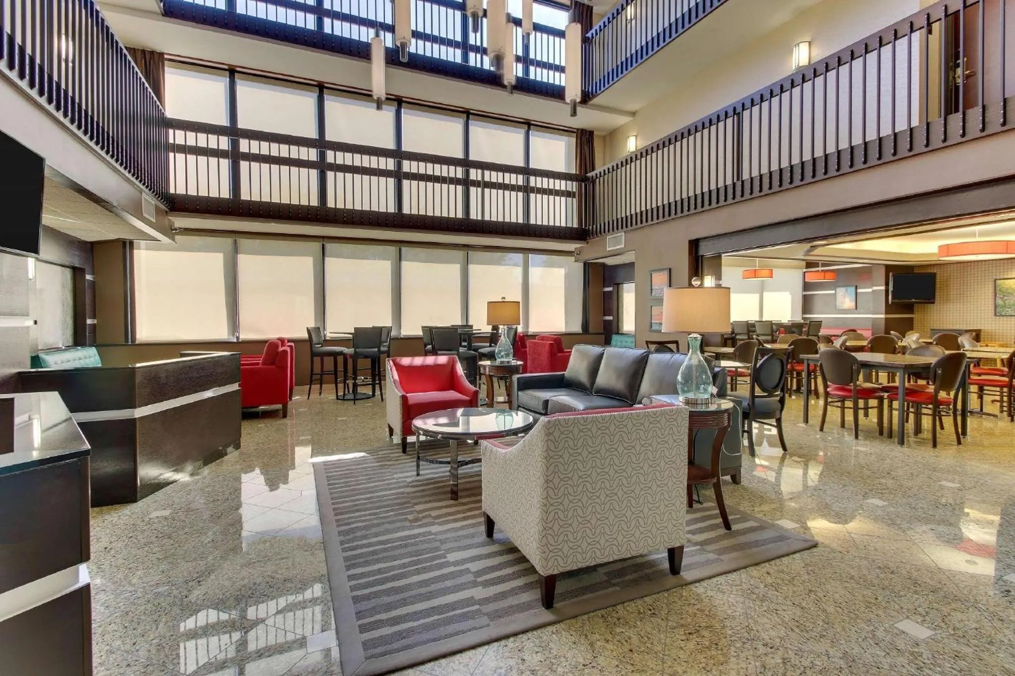 Communal lounge/ TV room in Heritage Inn Suites Houston Sugar Land, Trademark by Wyndham