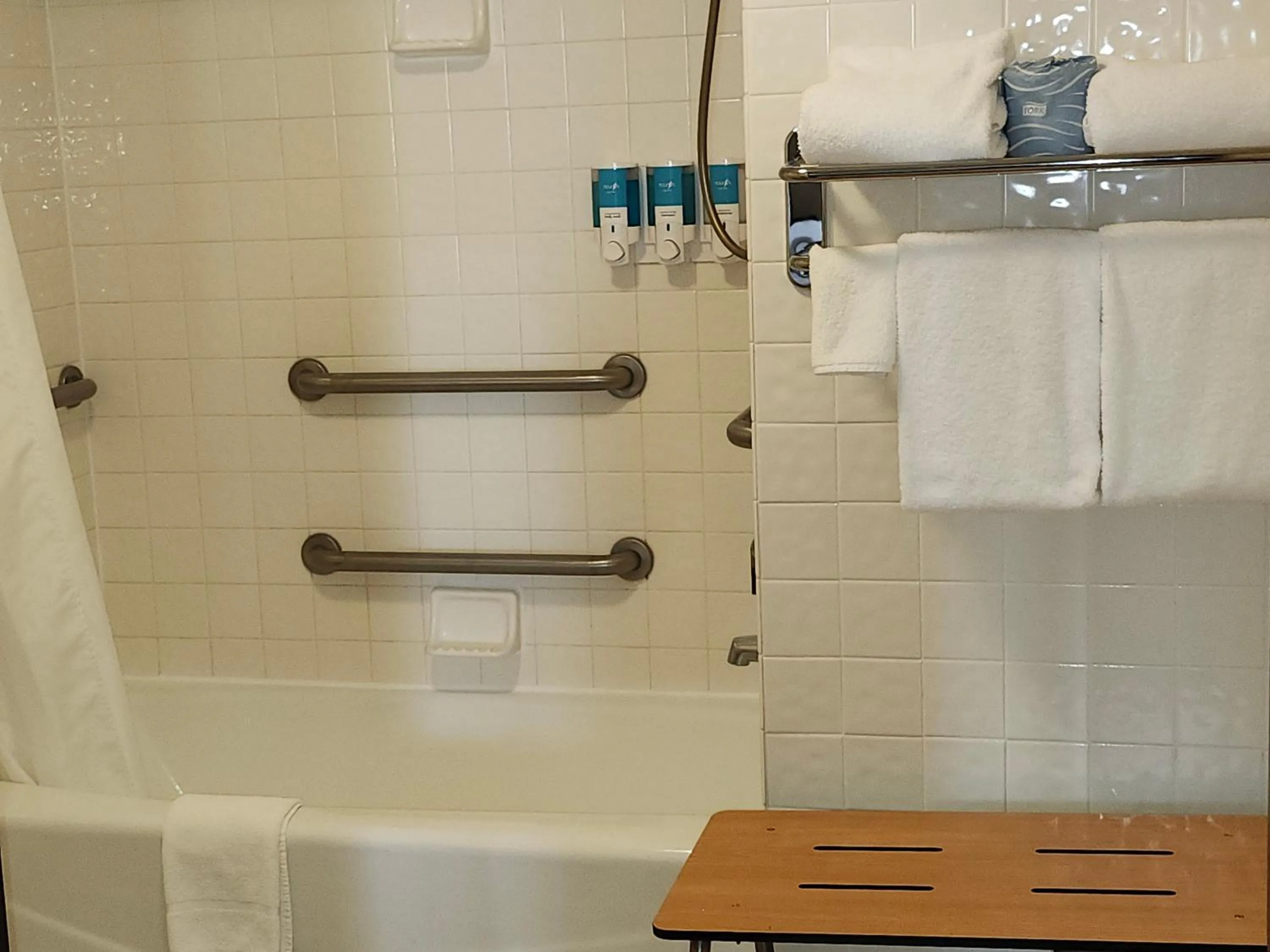 Bathroom in Heritage Inn Suites Houston Sugar Land, Trademark by Wyndham