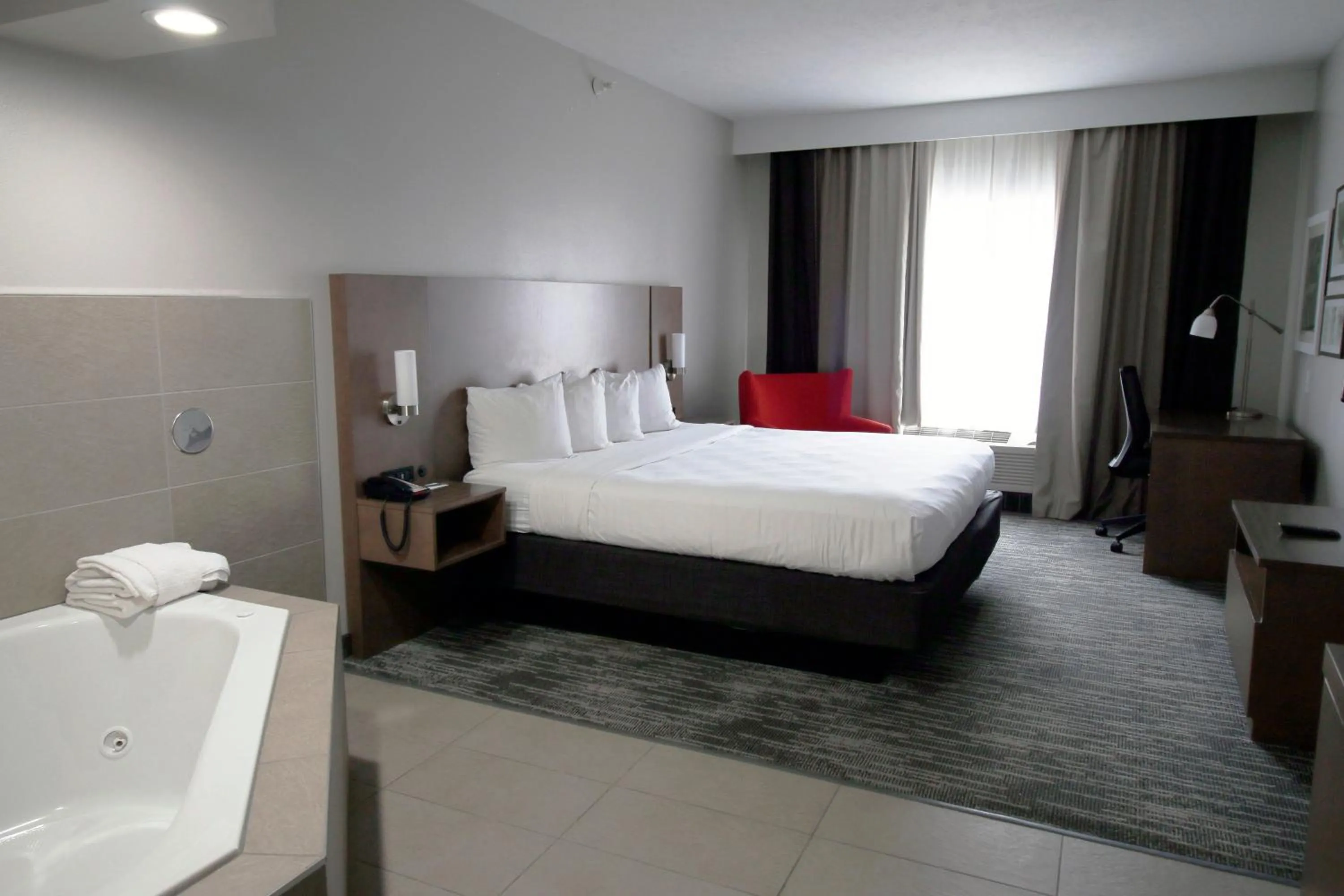 Bed in Country Inn & Suites by Radisson, Council Bluffs, IA