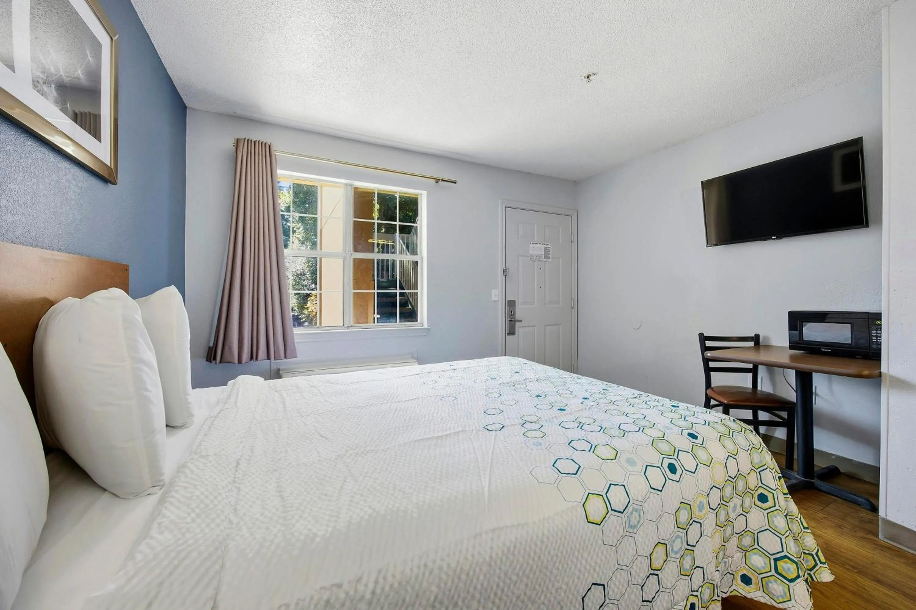 Photo of the whole room, Bed in HomeTowne Studios by Red Roof Atlanta - Peachtree Corners