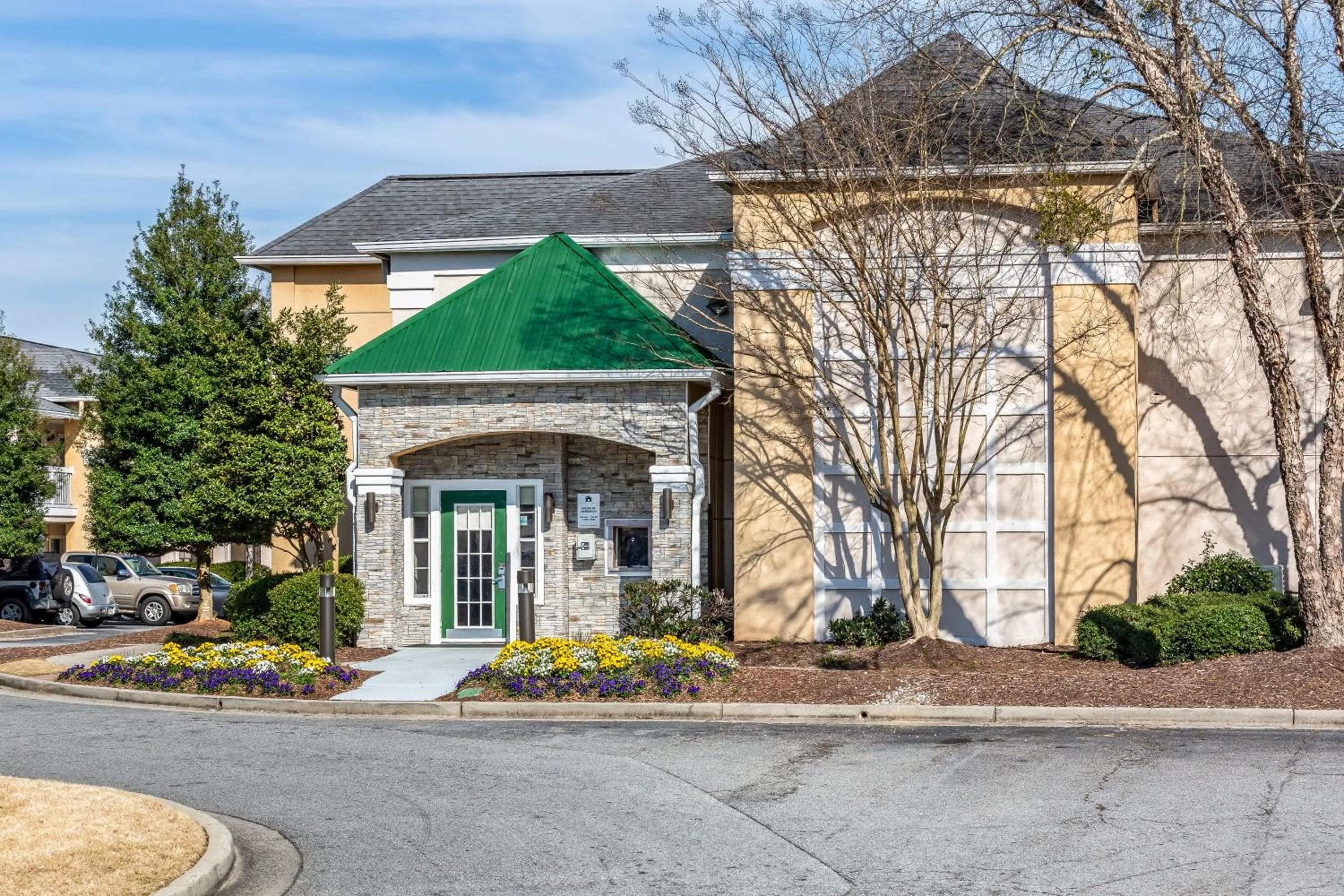 Property building in HomeTowne Studios by Red Roof - Atlanta NE - Peachtree Corners