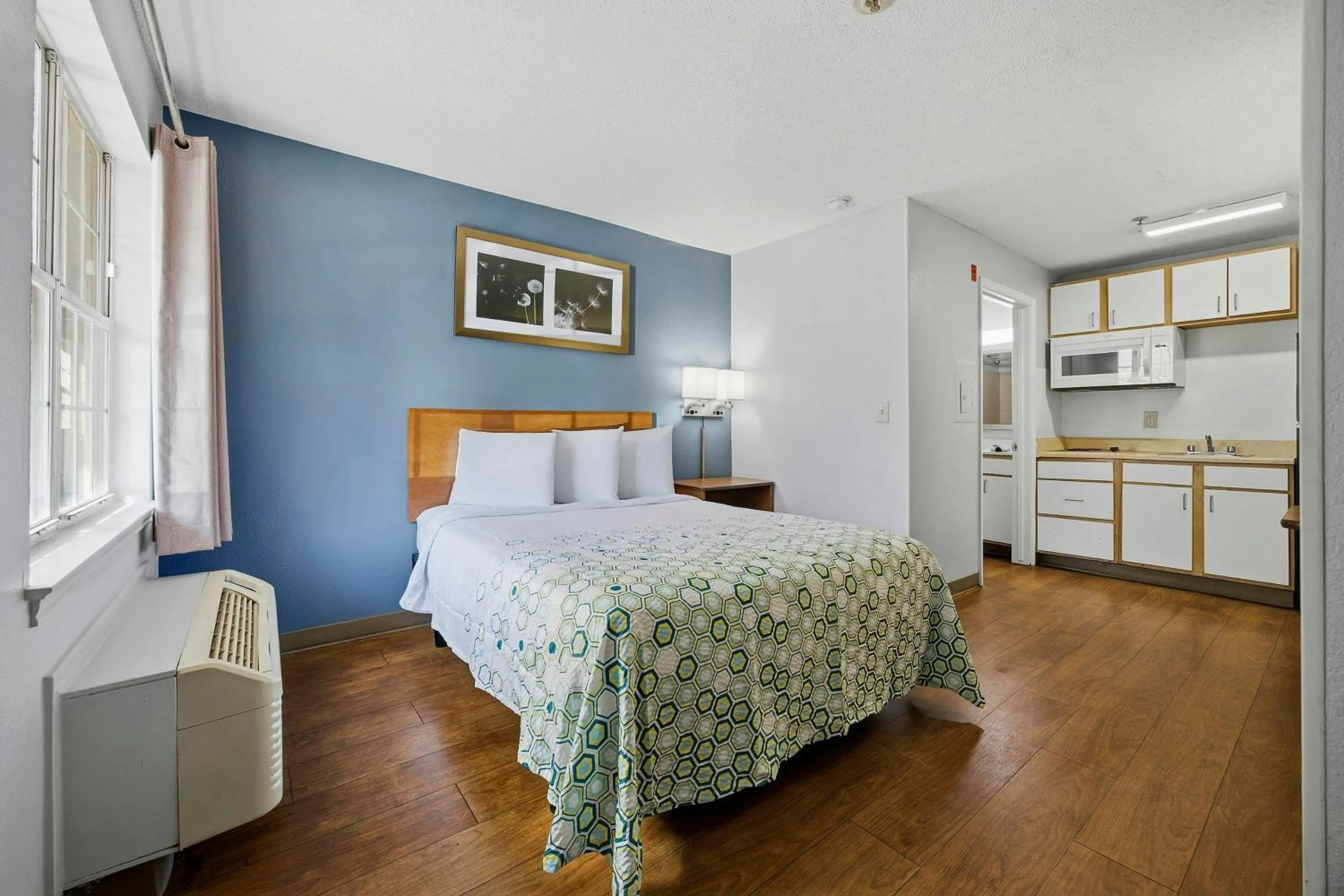 Photo of the whole room, Bed in HomeTowne Studios by Red Roof Atlanta - Peachtree Corners