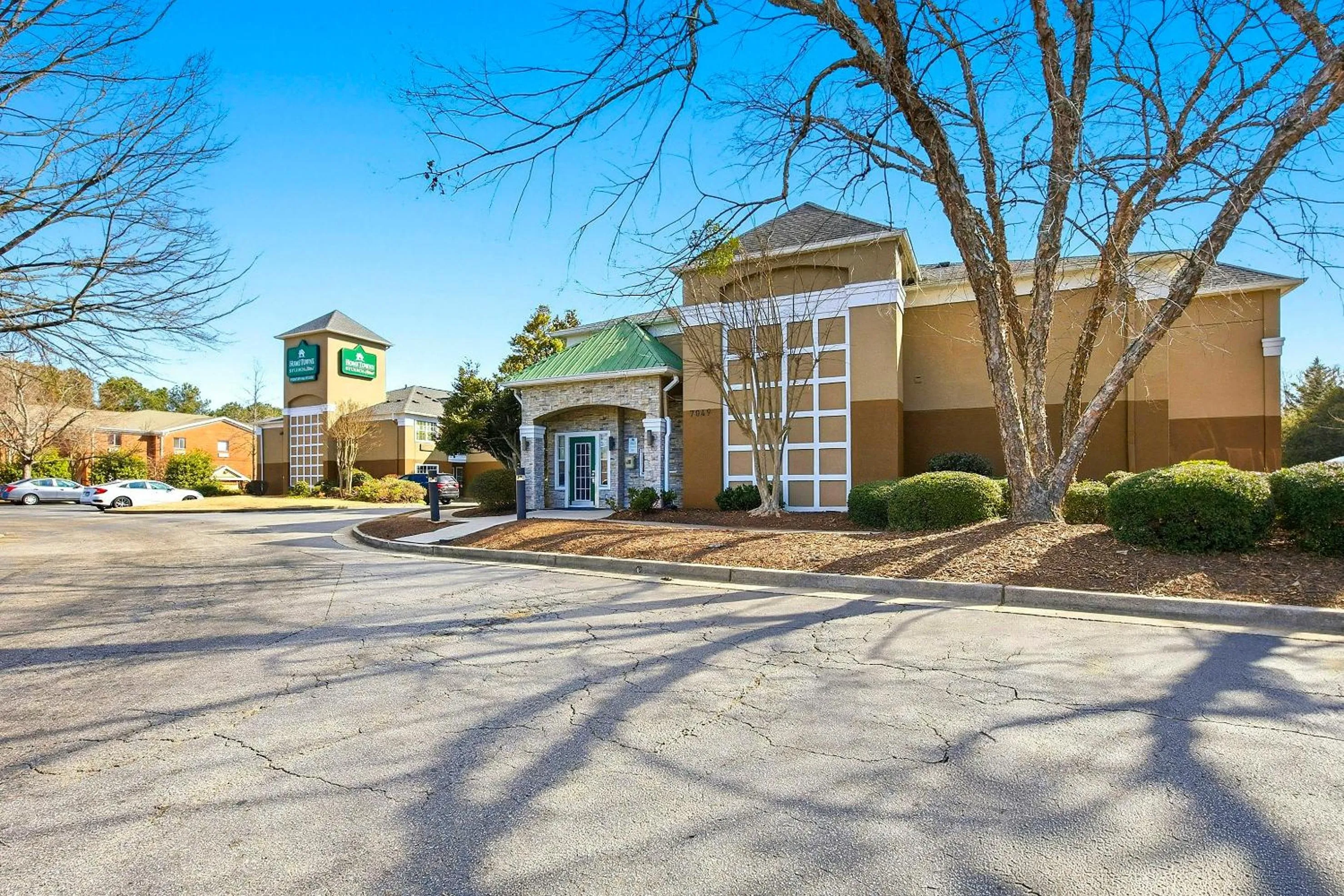Property building in HomeTowne Studios by Red Roof Atlanta - Peachtree Corners
