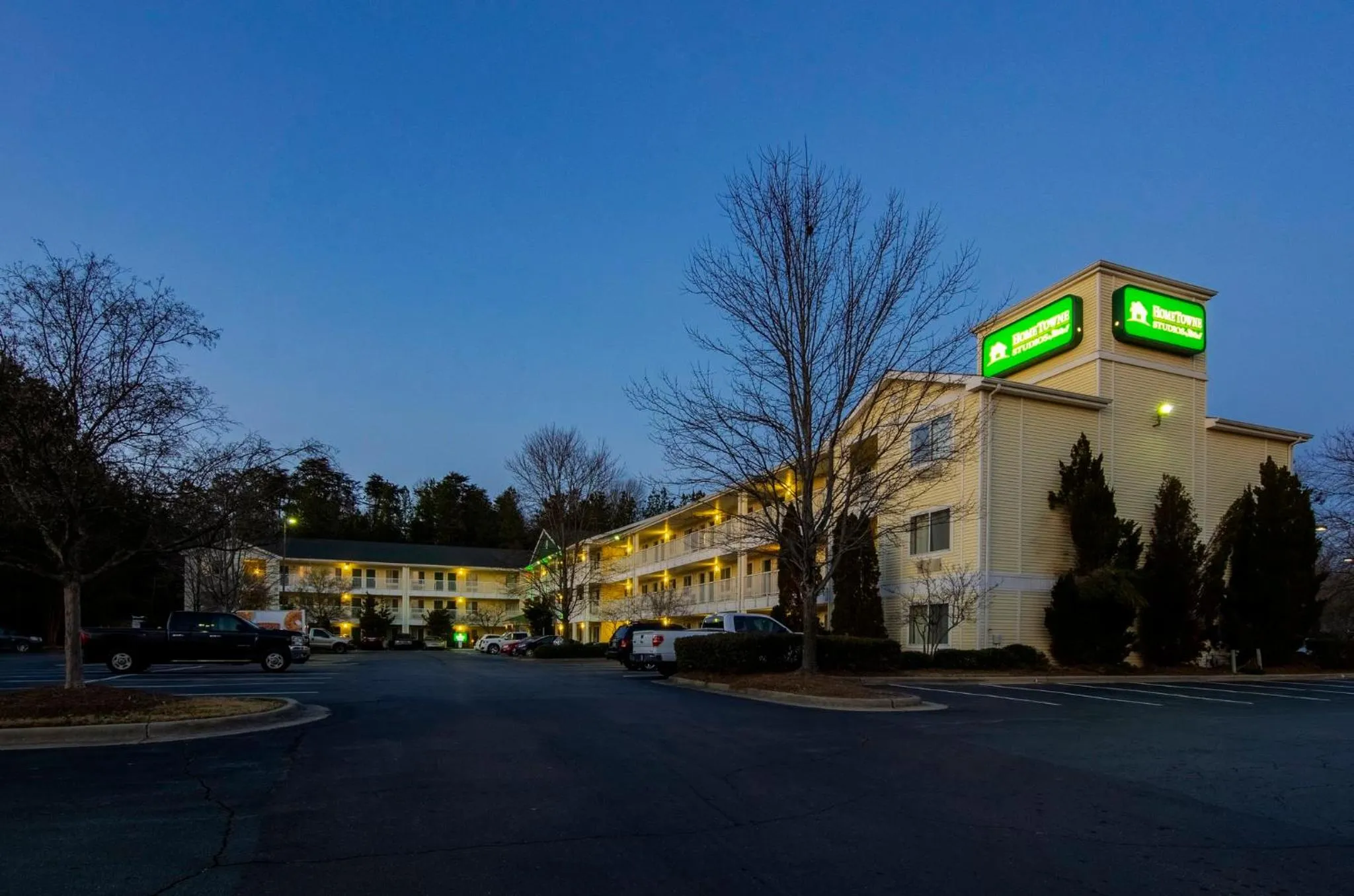 Property building in HomeTowne Studios by Red Roof Winston-Salem - University Pkwy