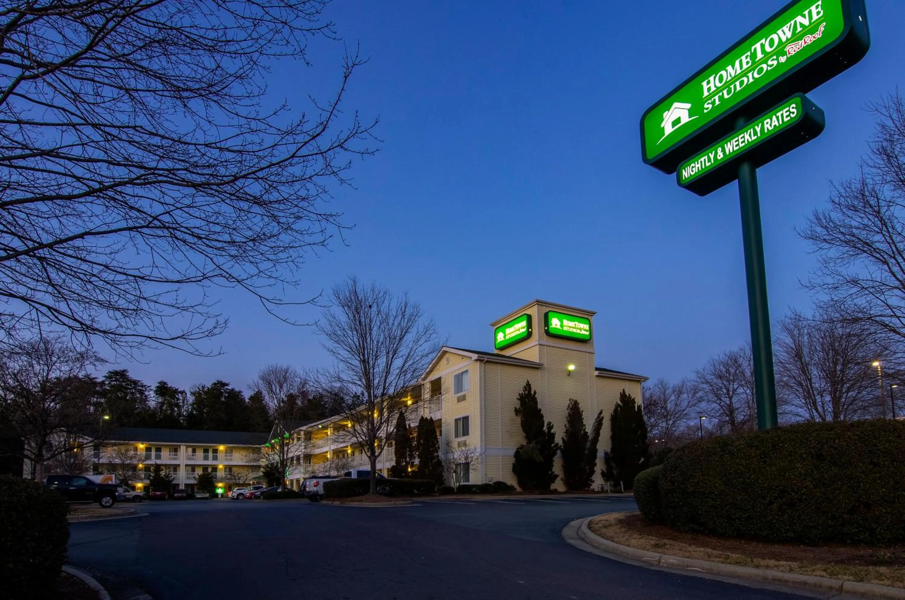 Property building in HomeTowne Studios by Red Roof Winston-Salem - University Pkwy