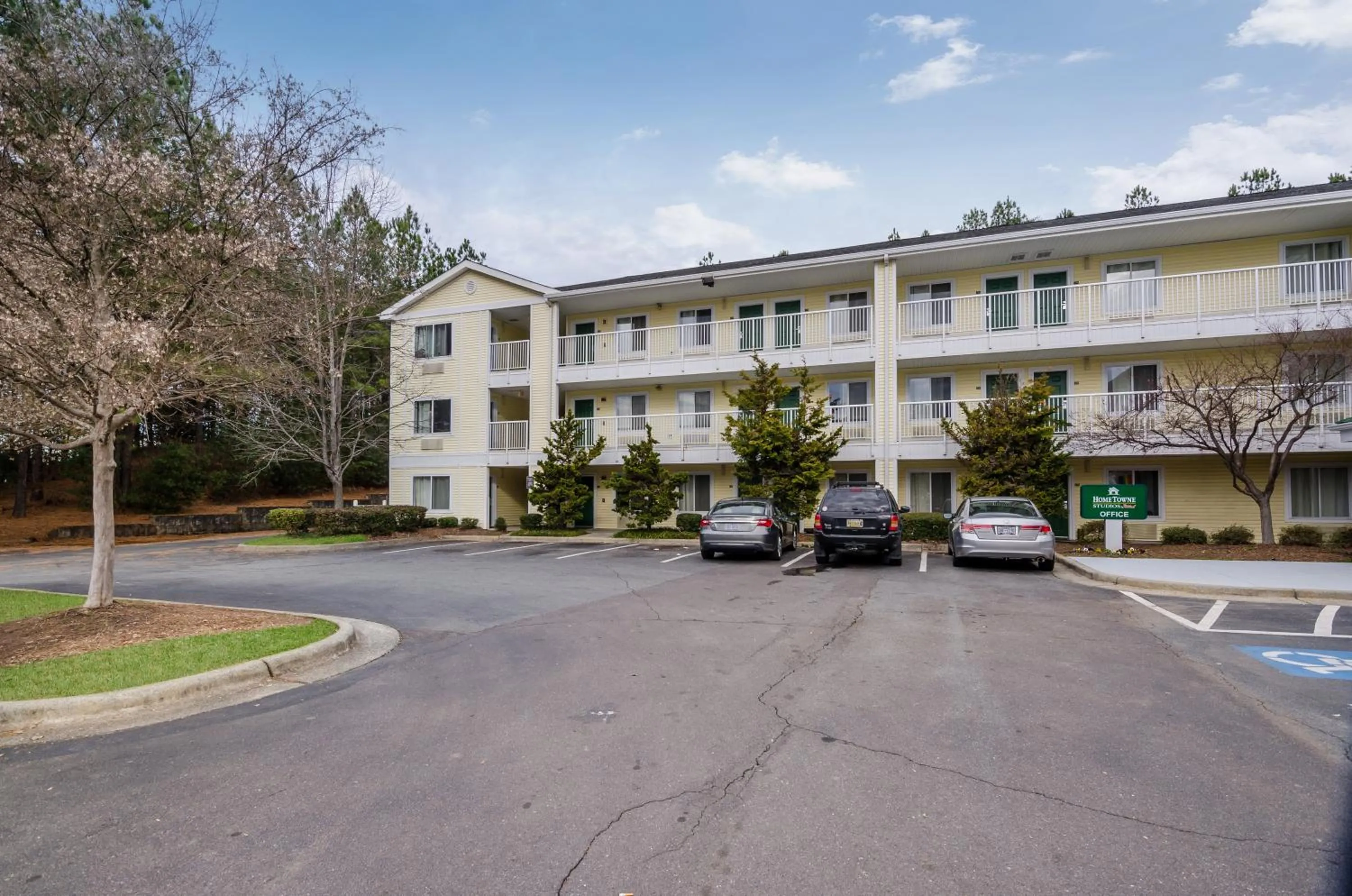 Property building in HomeTowne Studios by Red Roof Winston-Salem - University Pkwy