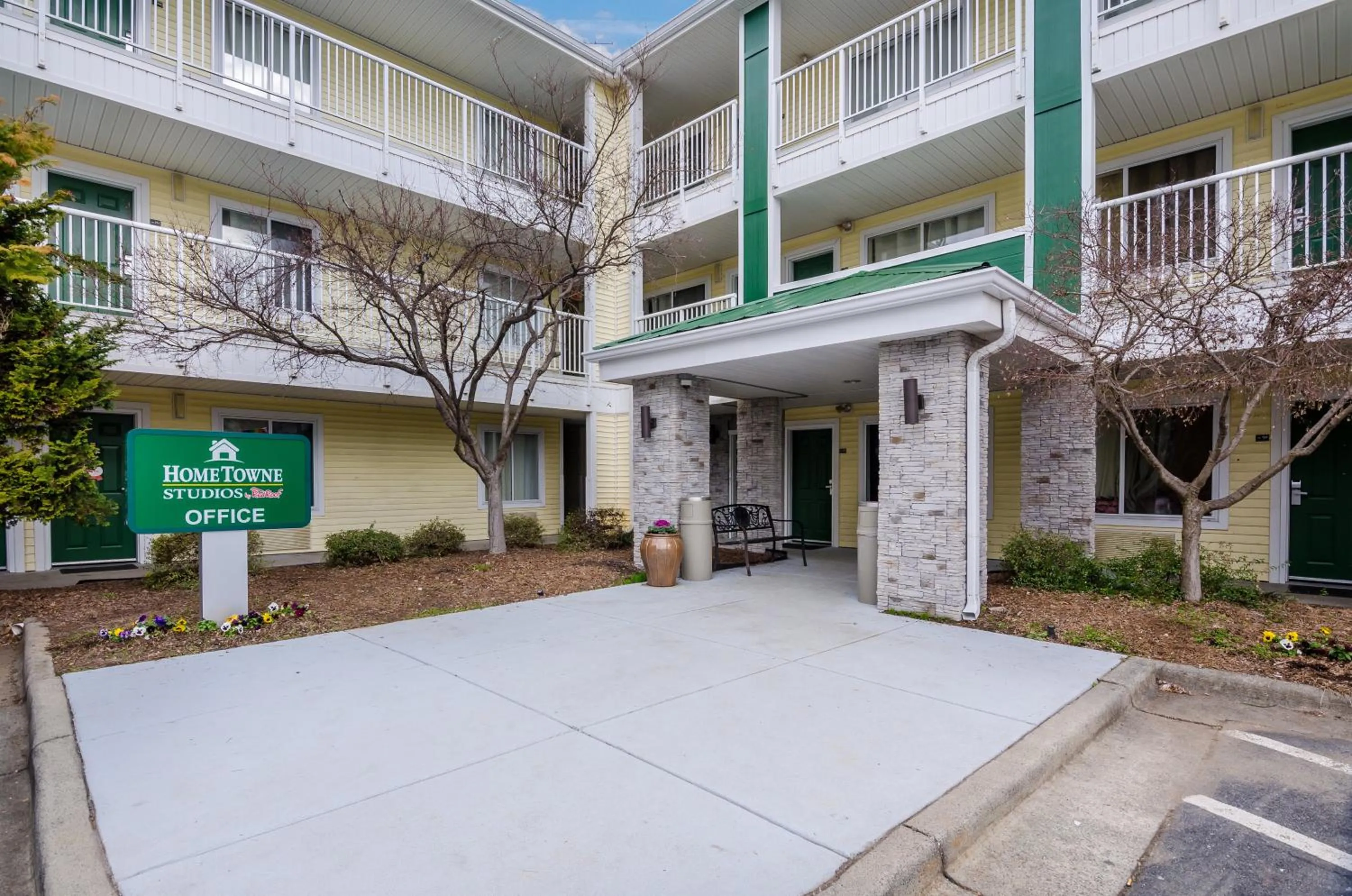 Property building in HomeTowne Studios by Red Roof Winston-Salem - University Pkwy