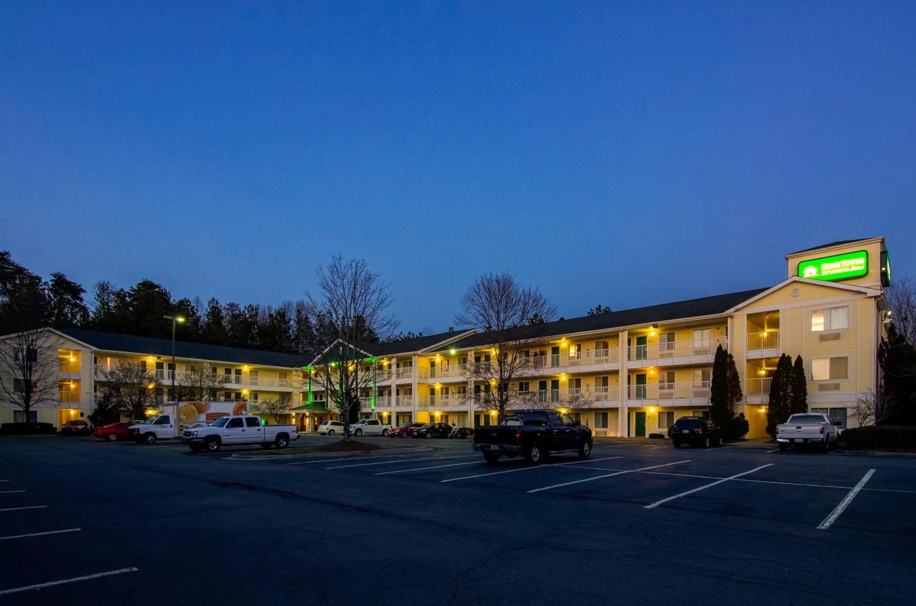 Property building in HomeTowne Studios by Red Roof Winston-Salem - University Pkwy