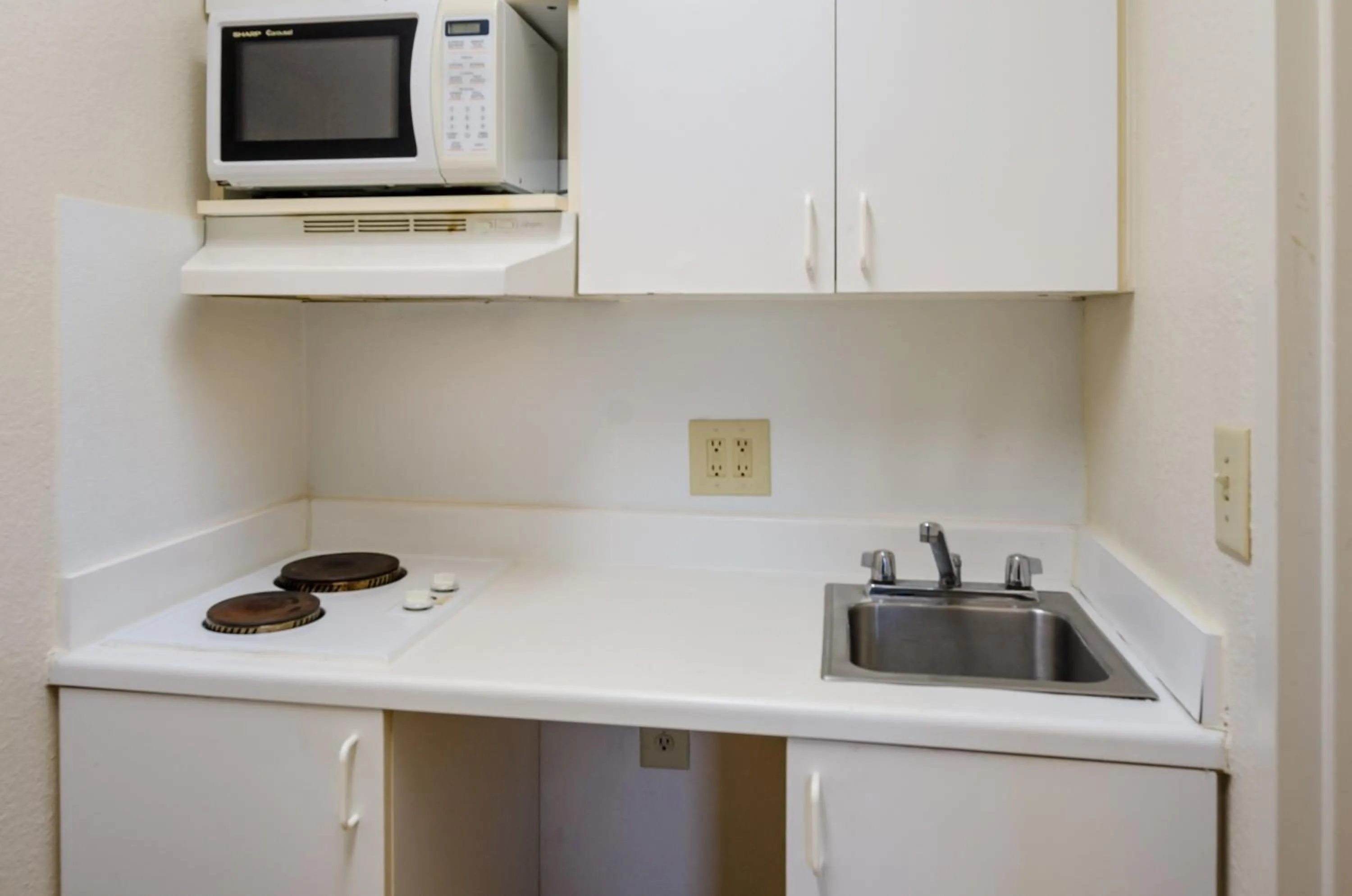 Photo of the whole room in HomeTowne Studios by Red Roof Winston-Salem - University Pkwy