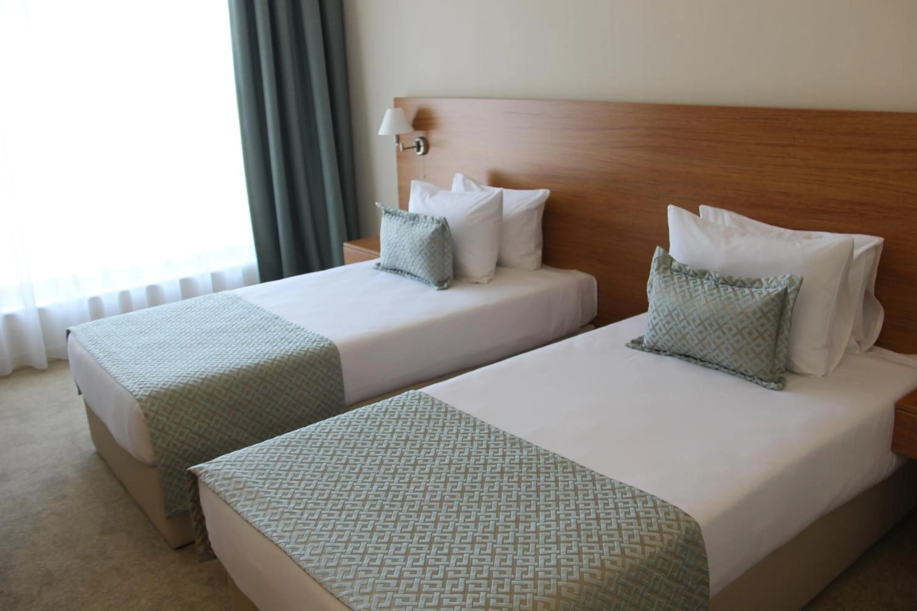 Bed in Khazar Inji Hotel