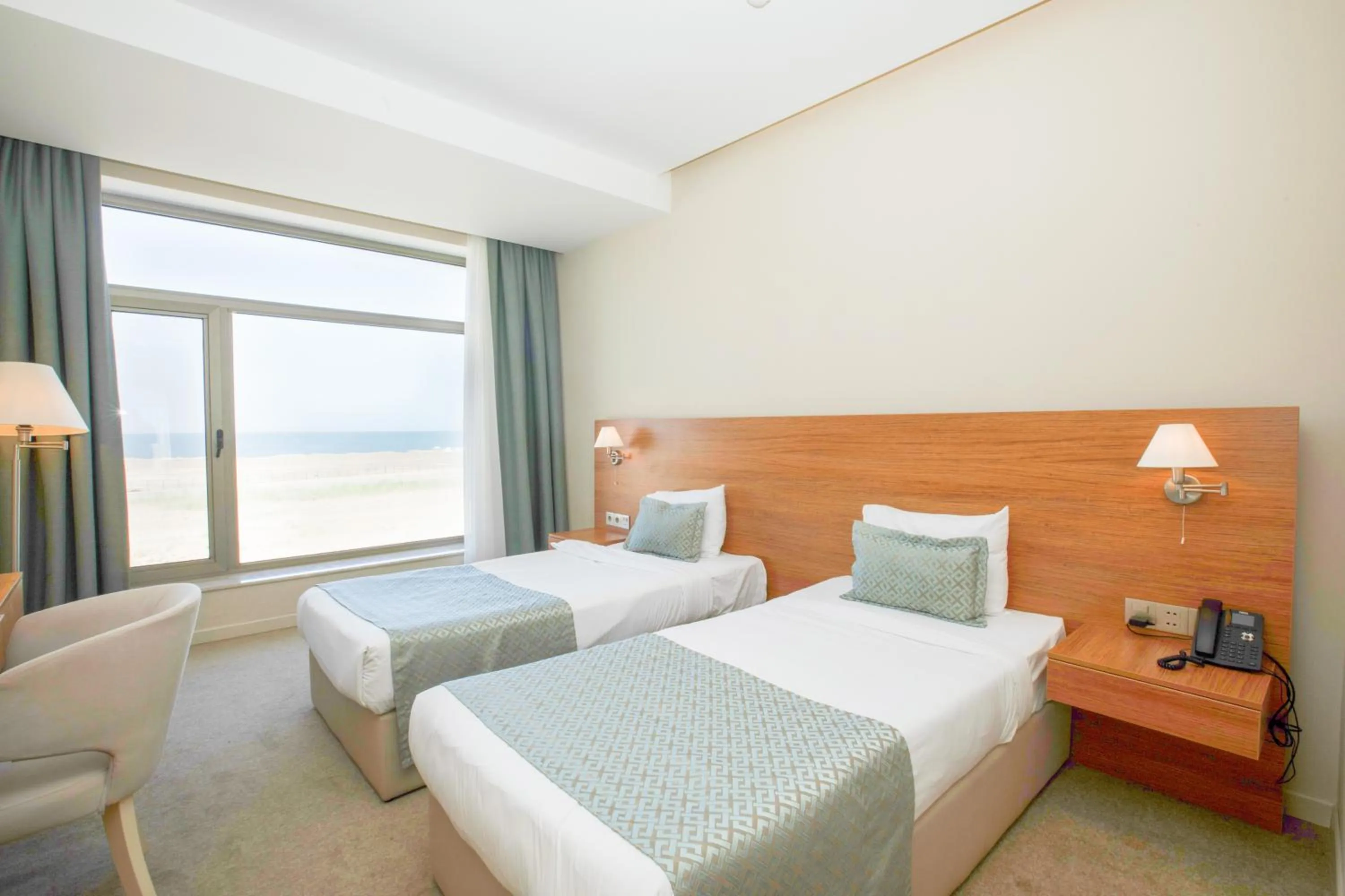 Bed in Khazar Inji Hotel