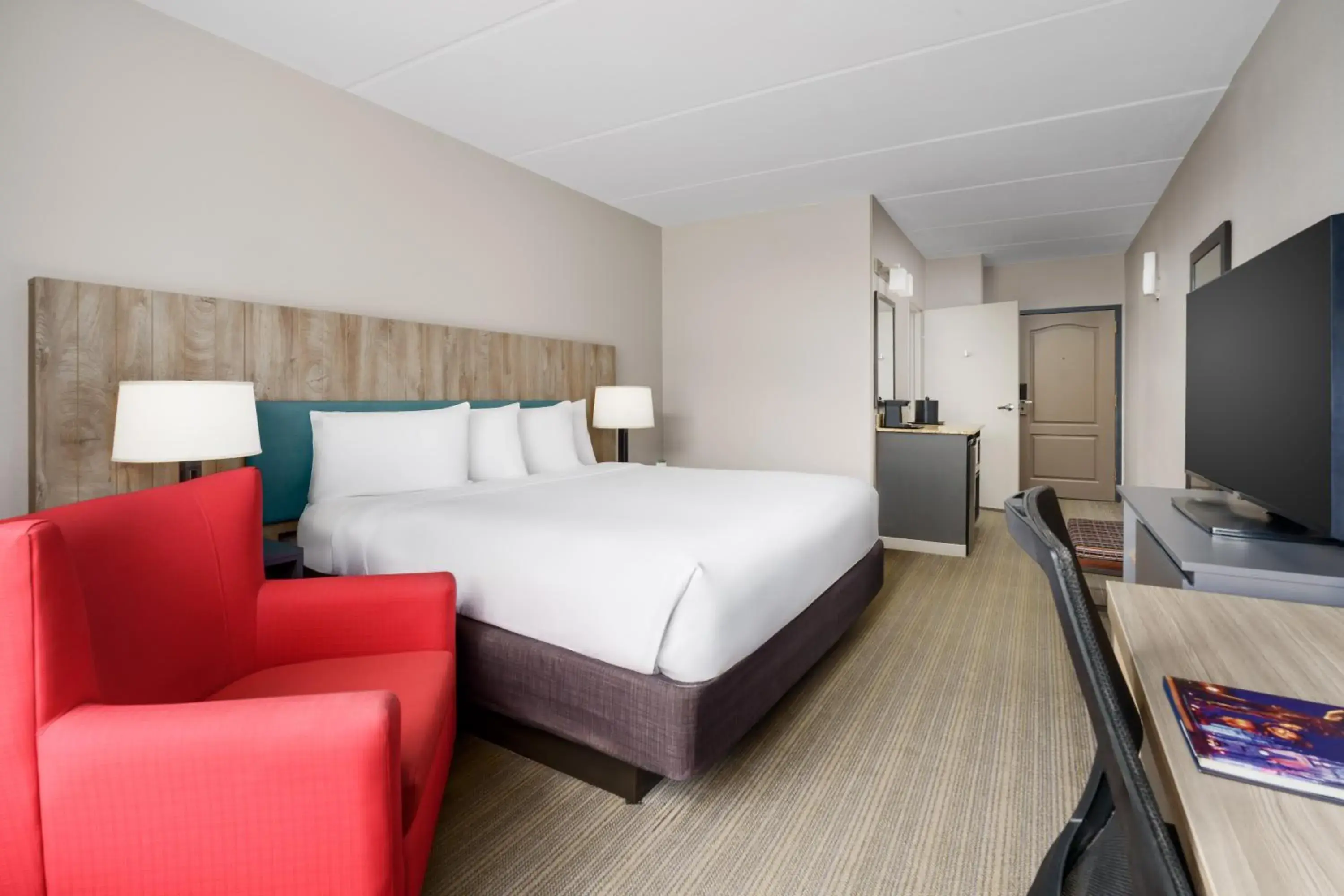 Bedroom, Bed in Country Inn & Suites by Radisson, Orlando Airport, FL Bedroom, Bed in Country Inn & Suites by Radisson, Orlando Airport, FL