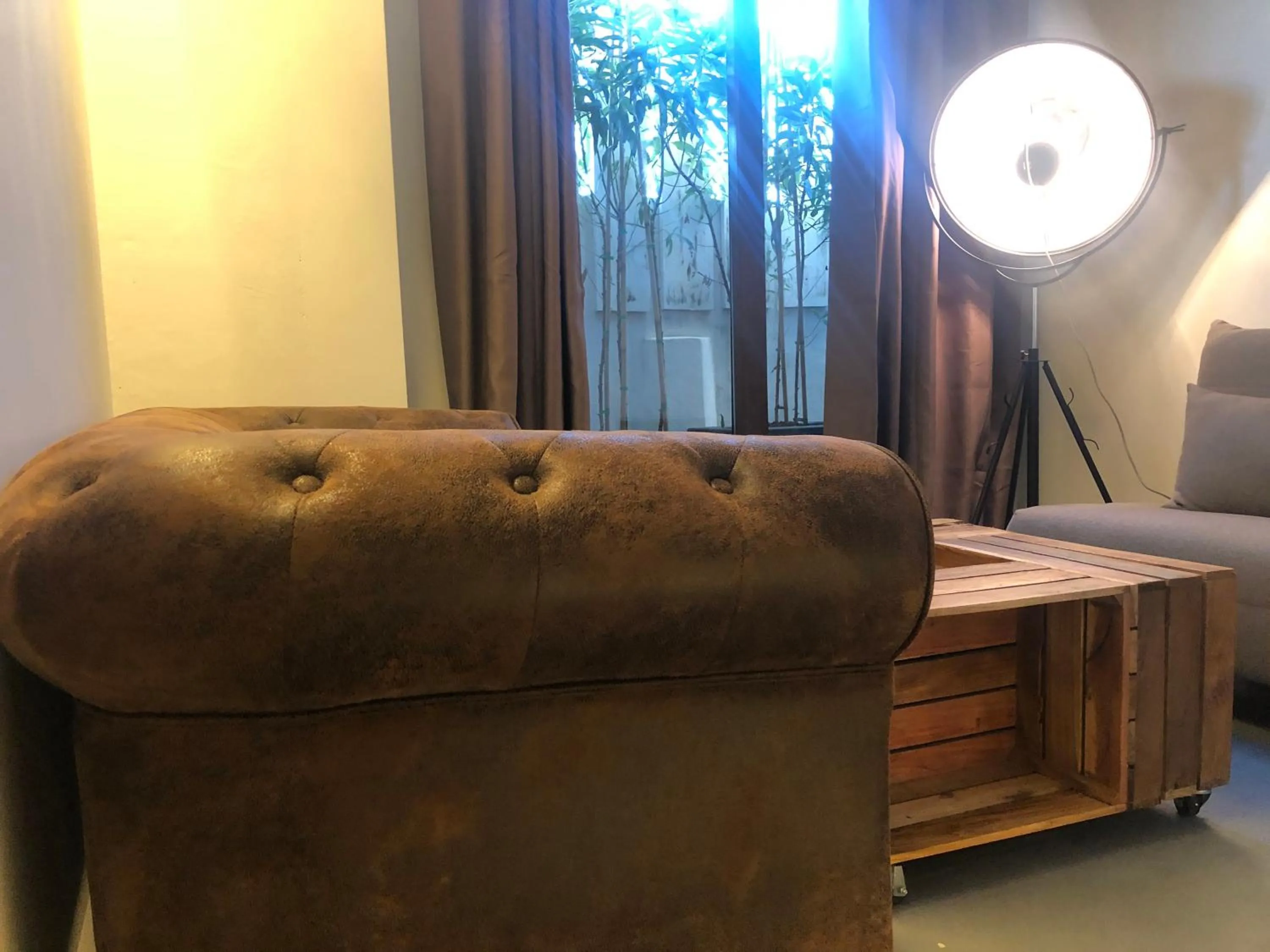 Living room, Bed in PAIISE Hotels