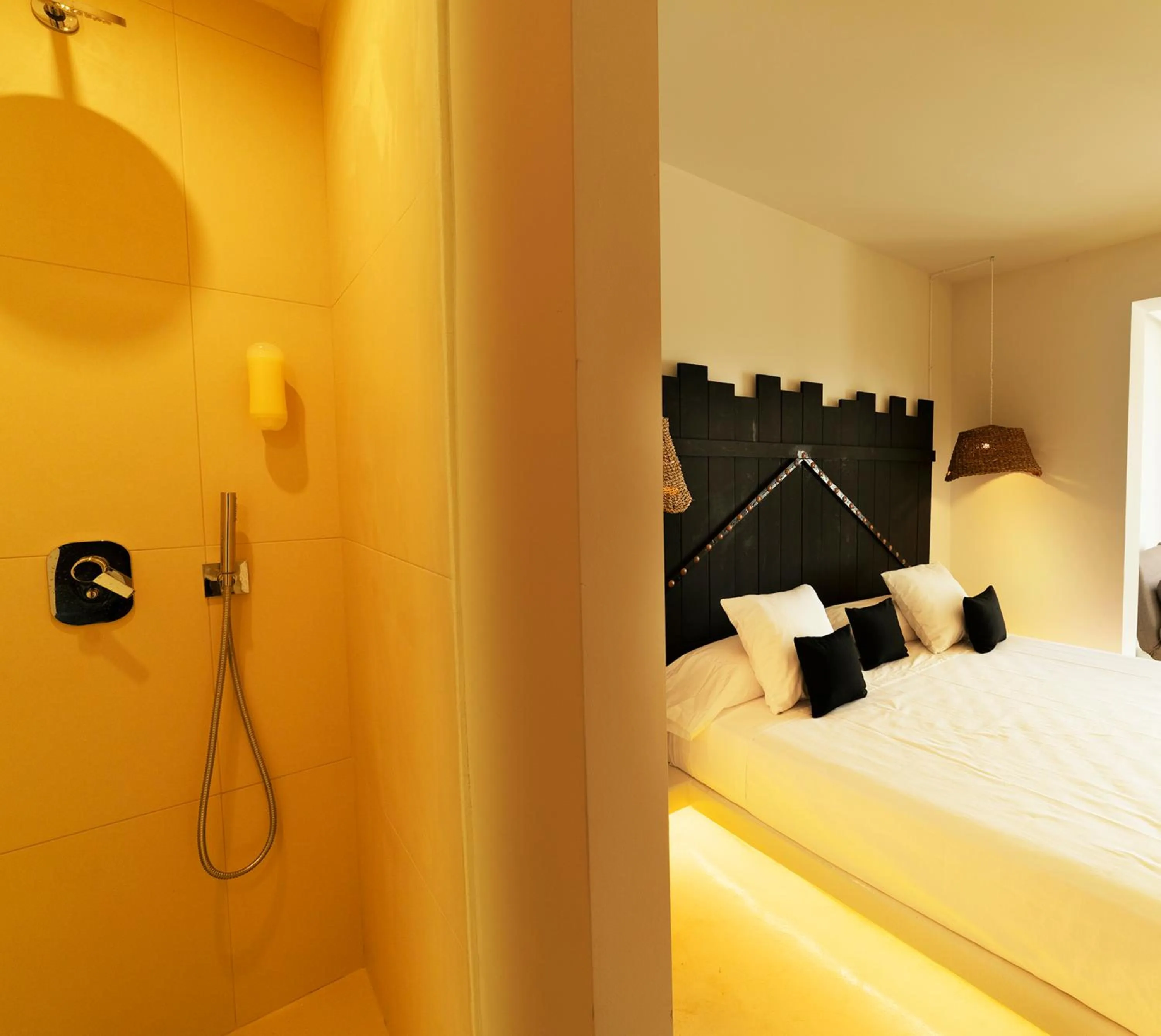 Bed in PAIISE Hotels