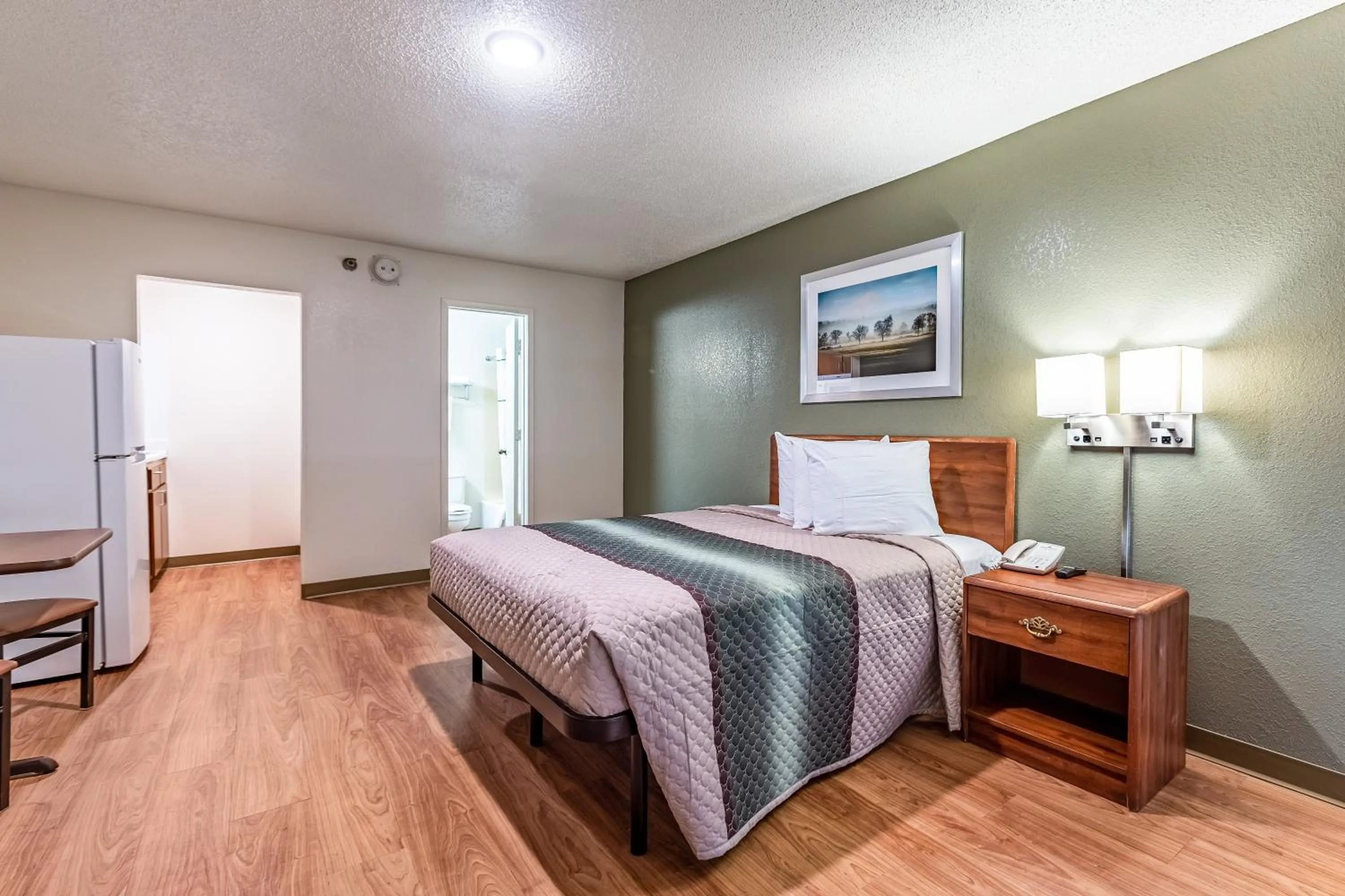 Photo of the whole room, Bed in HomeTowne Studios by Red Roof Atlanta NE - Downtown Norcross