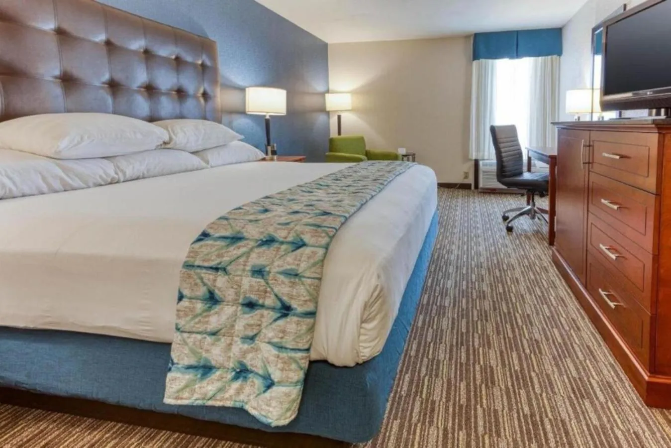 Bed in Heritage Inn & Suites St Louis Fenton, Trademark by Wyndham