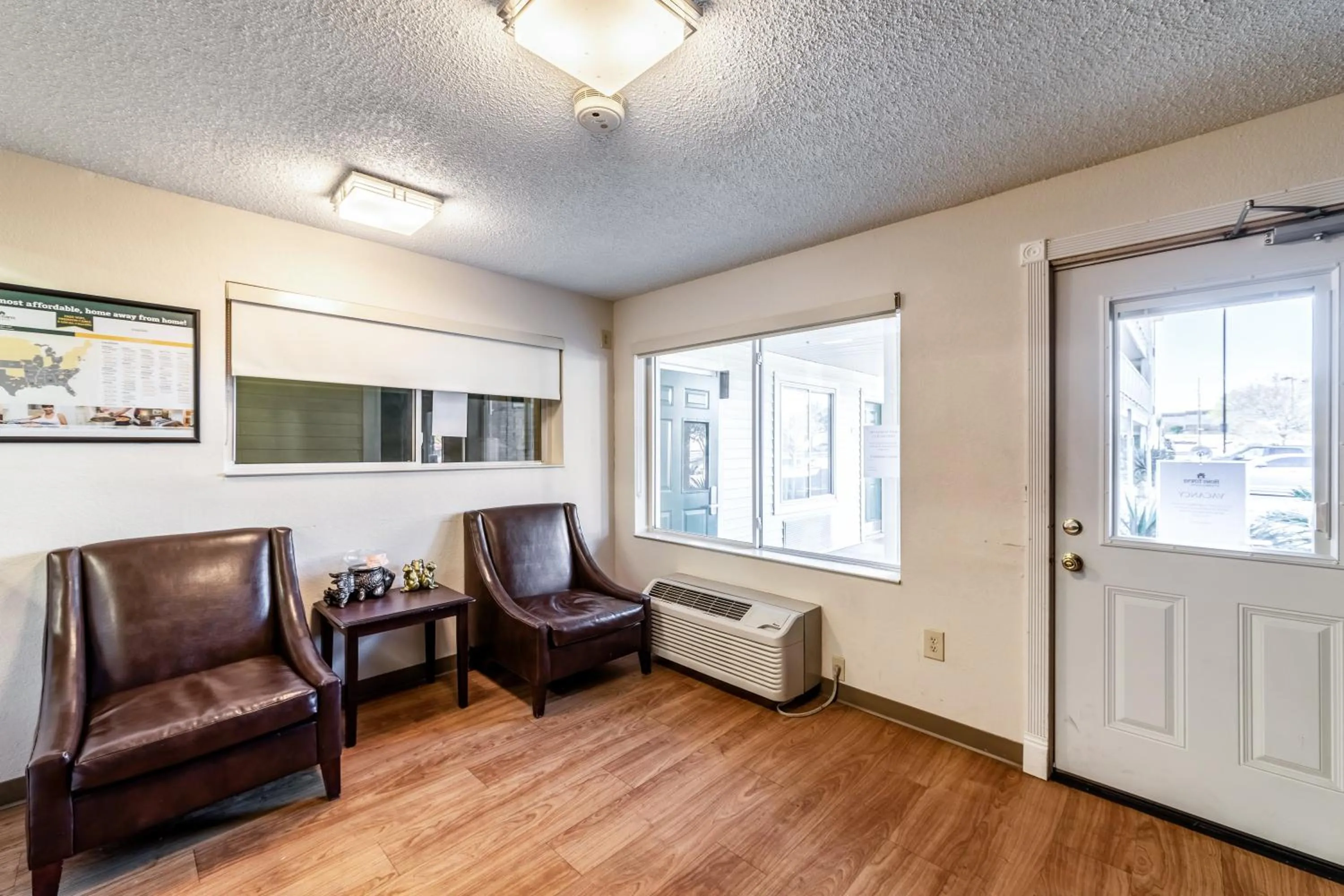 Lobby or reception in HomeTowne Studios by Red Roof Austin