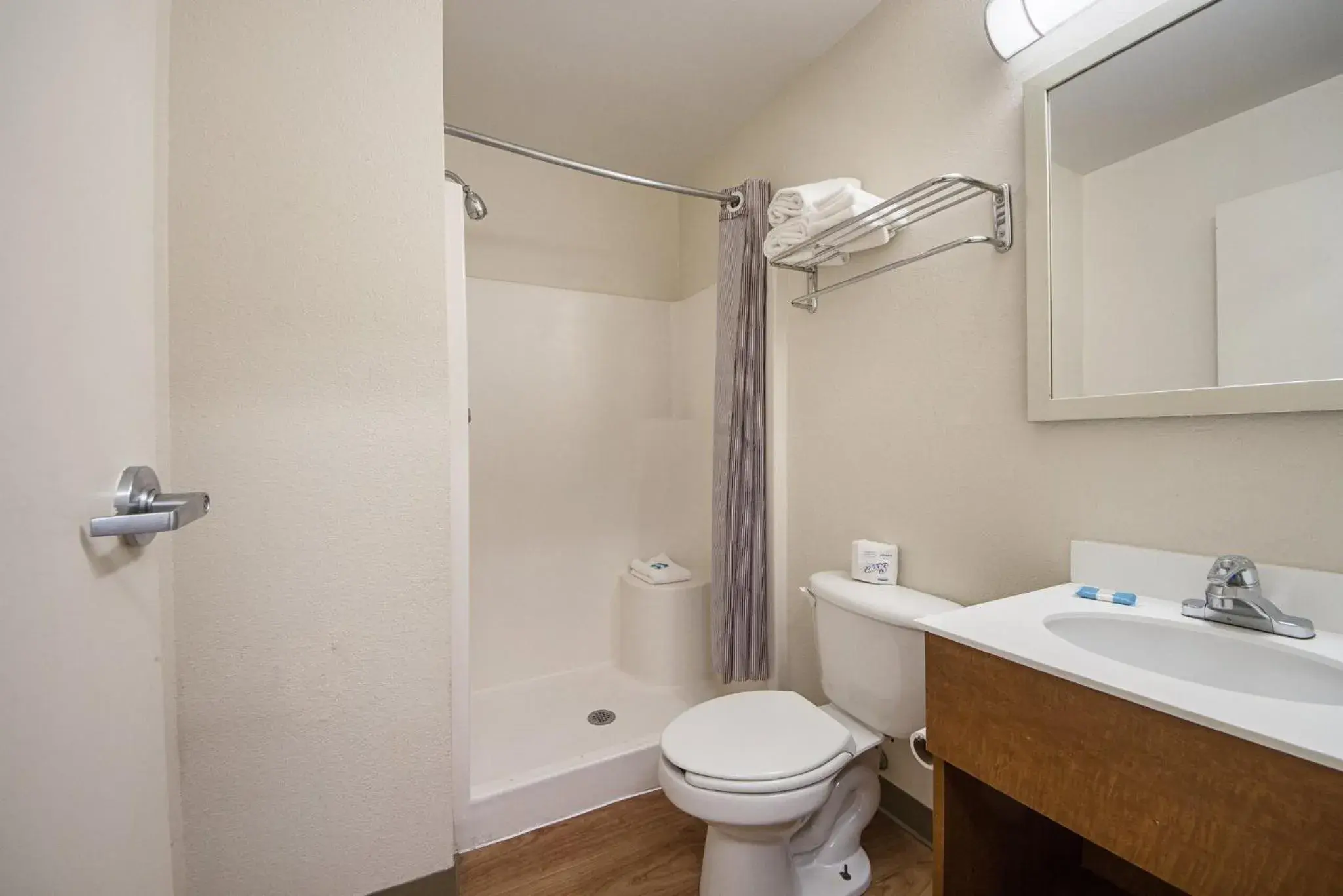 Bathroom in HomeTowne Studios by Red Roof Dallas - Irving Bathroom in HomeTowne Studios by Red Roof Dallas - Irving