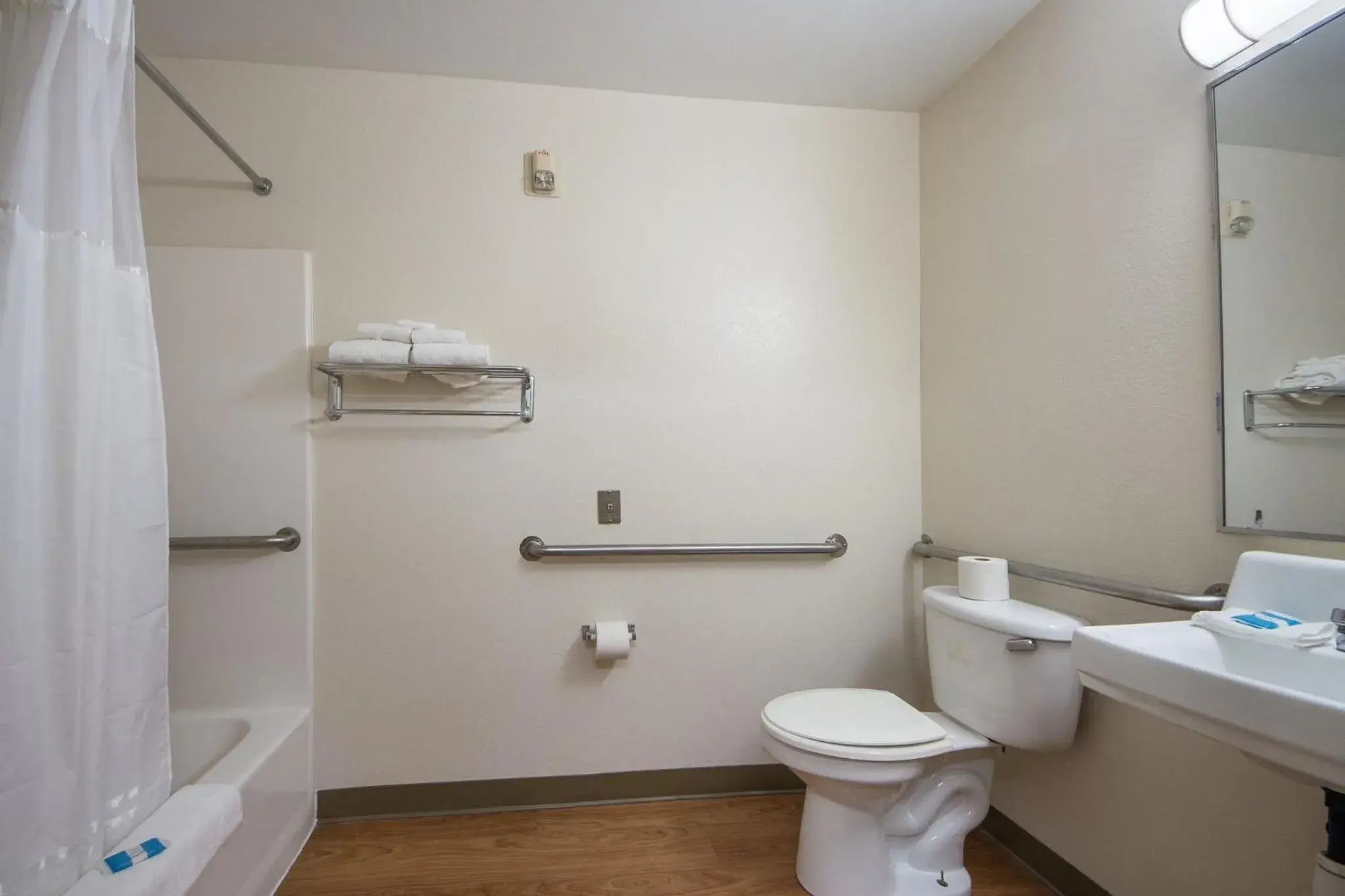 Bathroom in HomeTowne Studios by Red Roof Dallas - Irving Bathroom in HomeTowne Studios by Red Roof Dallas - Irving