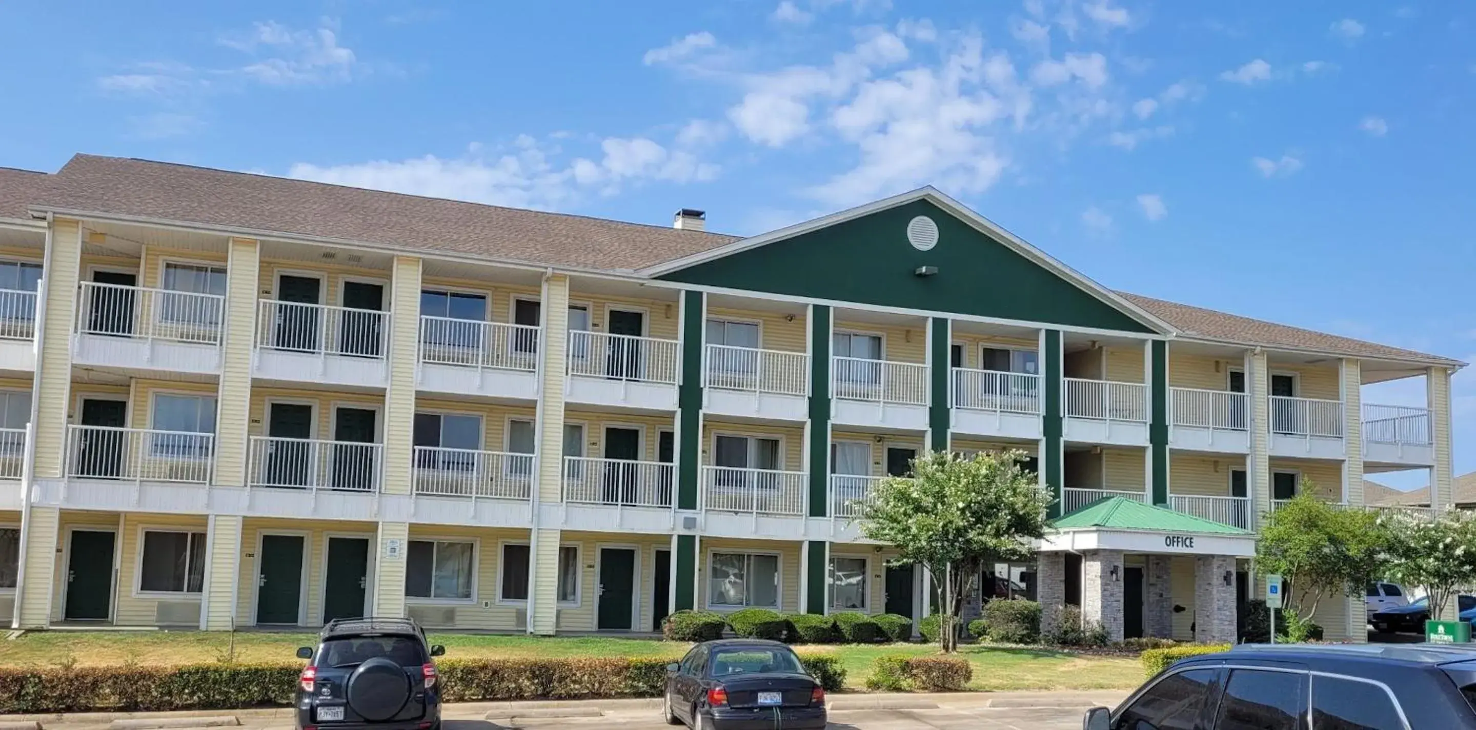 Property building in HomeTowne Studios by Red Roof Dallas - Irving Property building in HomeTowne Studios by Red Roof Dallas - Irving