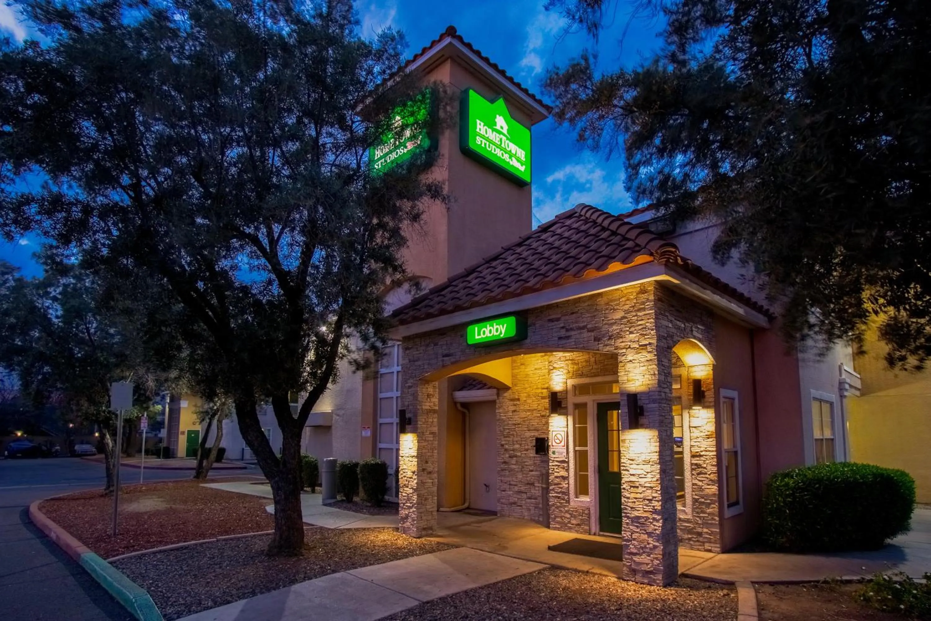 Property building in HomeTowne Studios by Red Roof Phoenix - Dunlap Ave