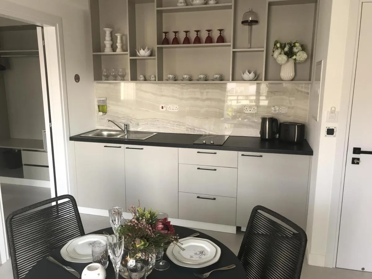 Kitchen or kitchenette in Levante Holiday Apartments