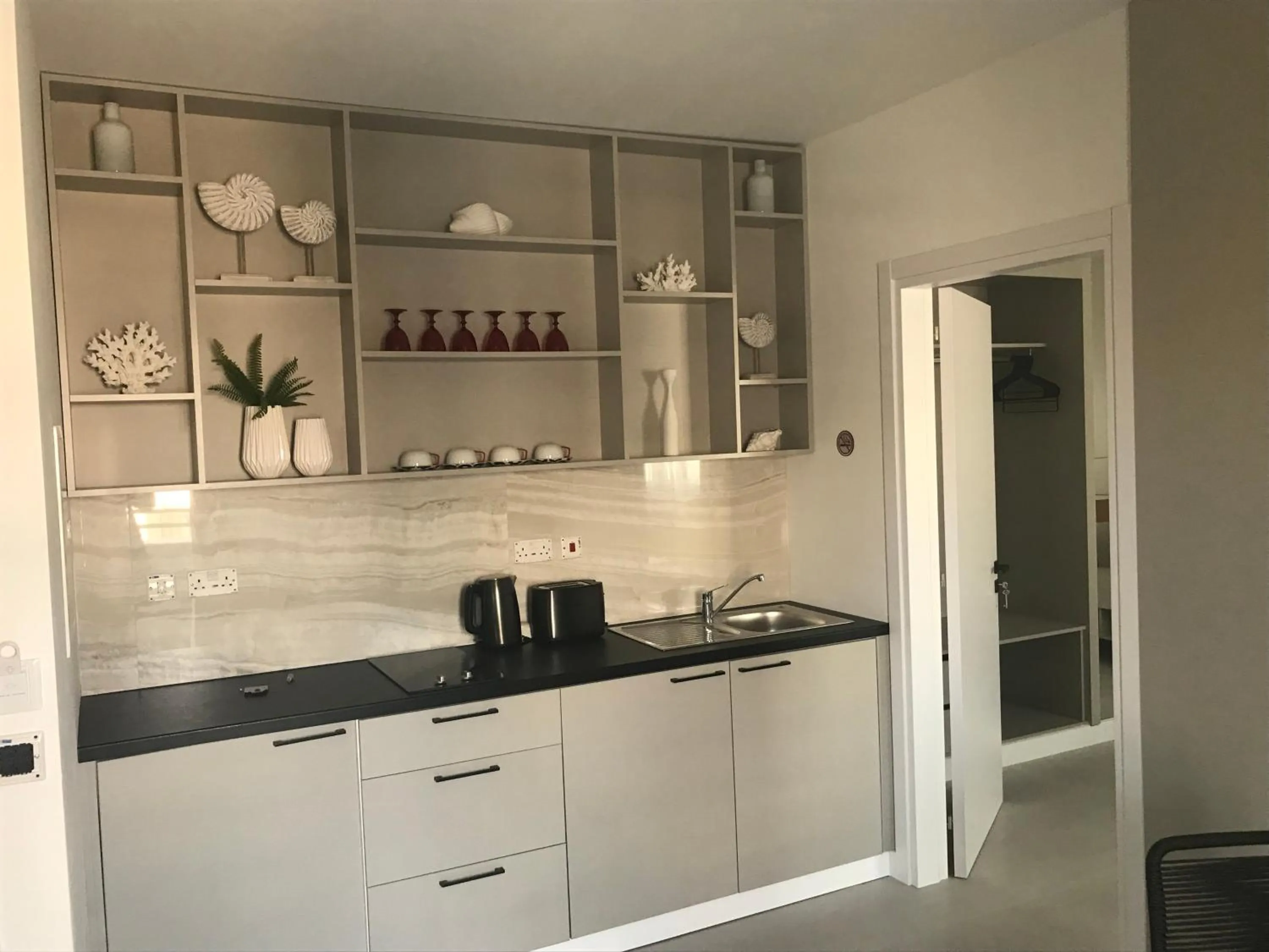 Kitchen or kitchenette in Levante Holiday Apartments