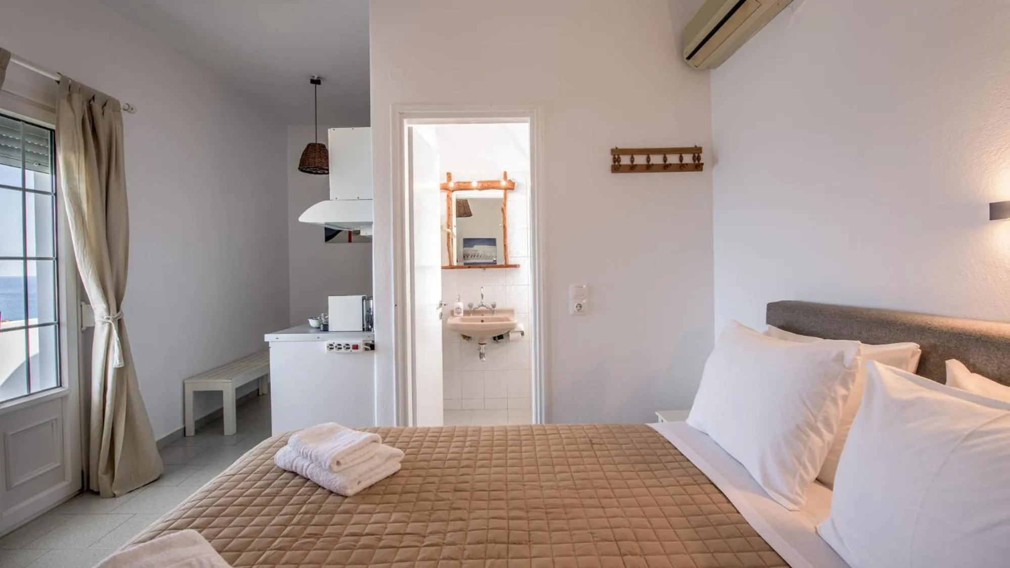 Bed in Giourgas Studios & Apartments