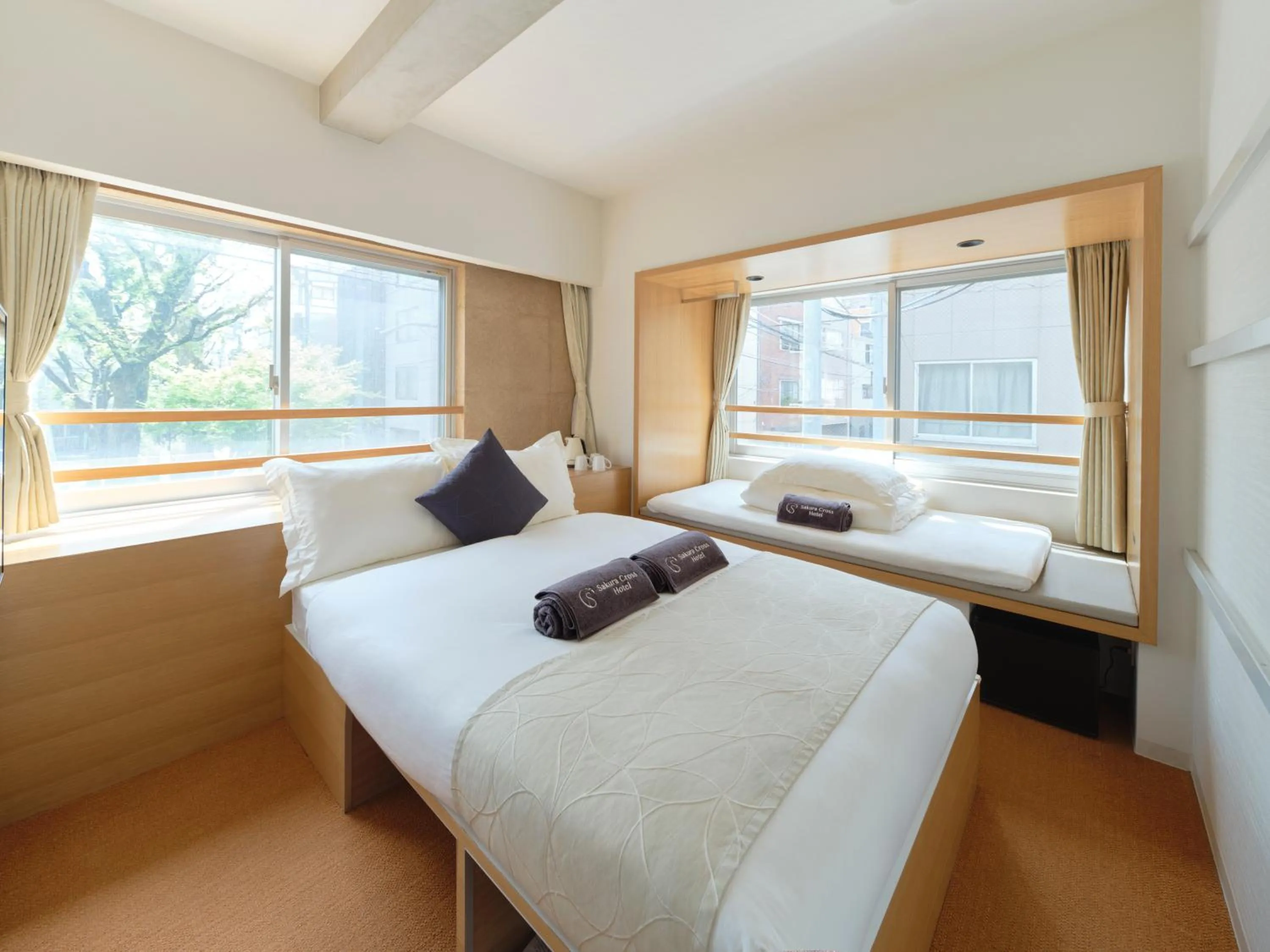 Bed in Sakura Cross Hotel Ueno Okachimachi