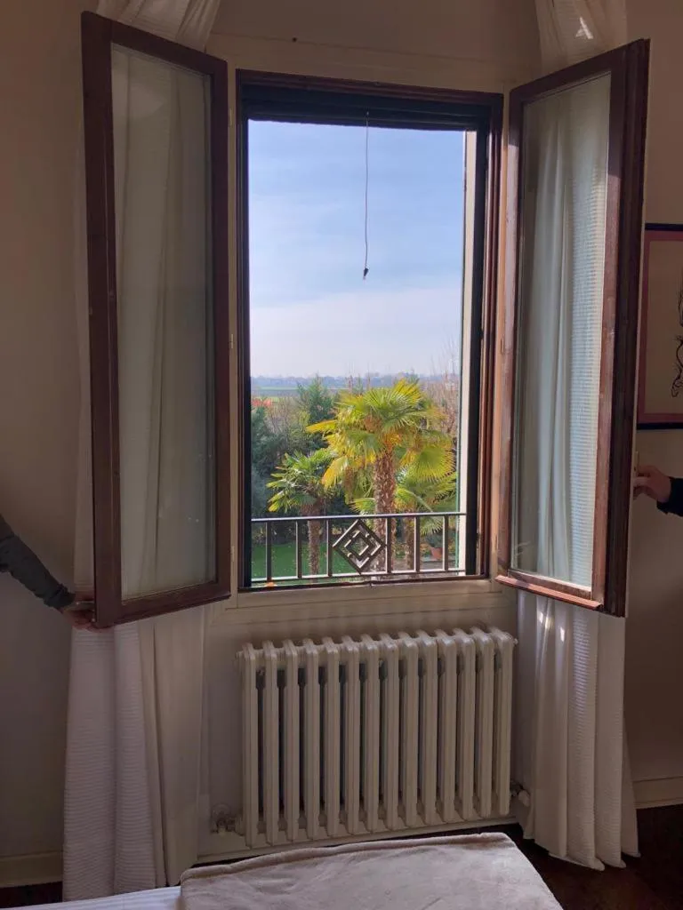 Garden view, Bed in B&B Villa delle Palme