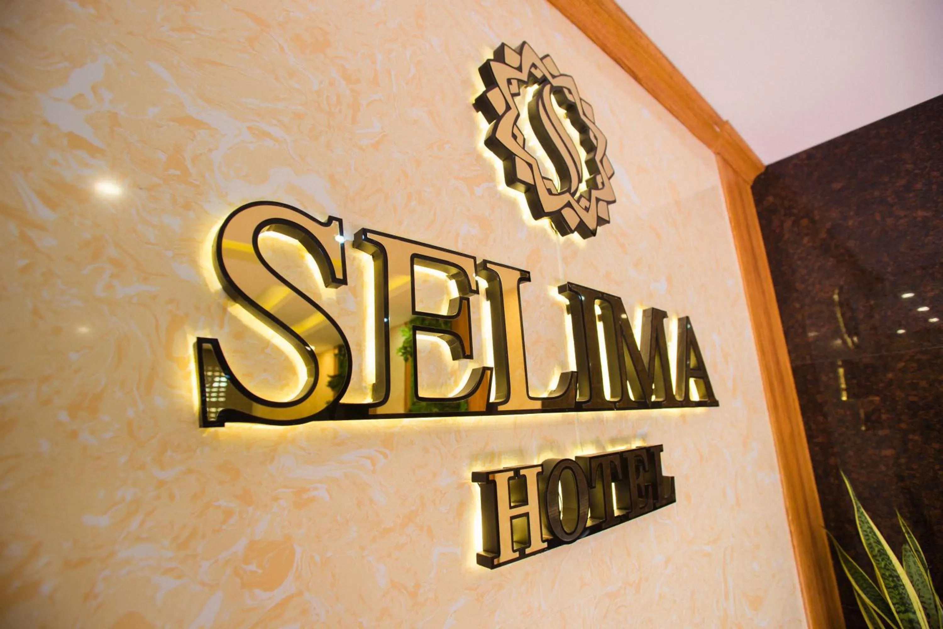 Property logo or sign in Selima Hotel