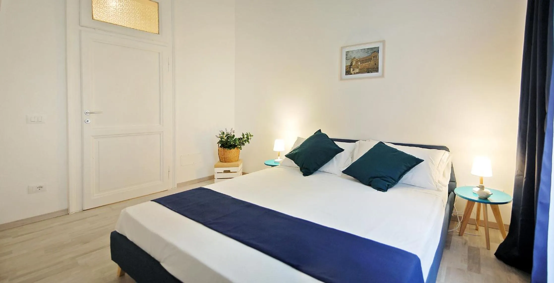 Bed in Pompeo Magno White Luxury Apartment