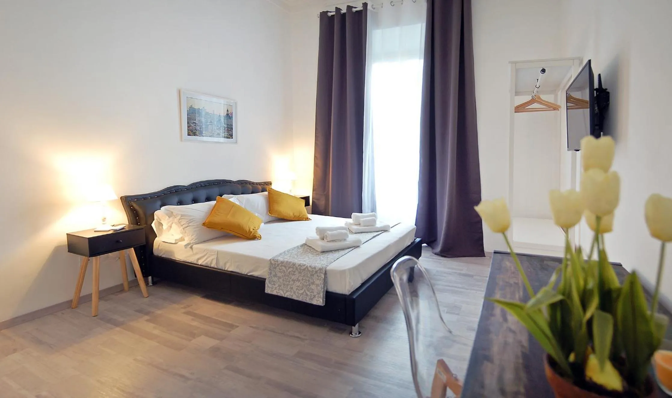 Bed in Pompeo Magno White Luxury Apartment