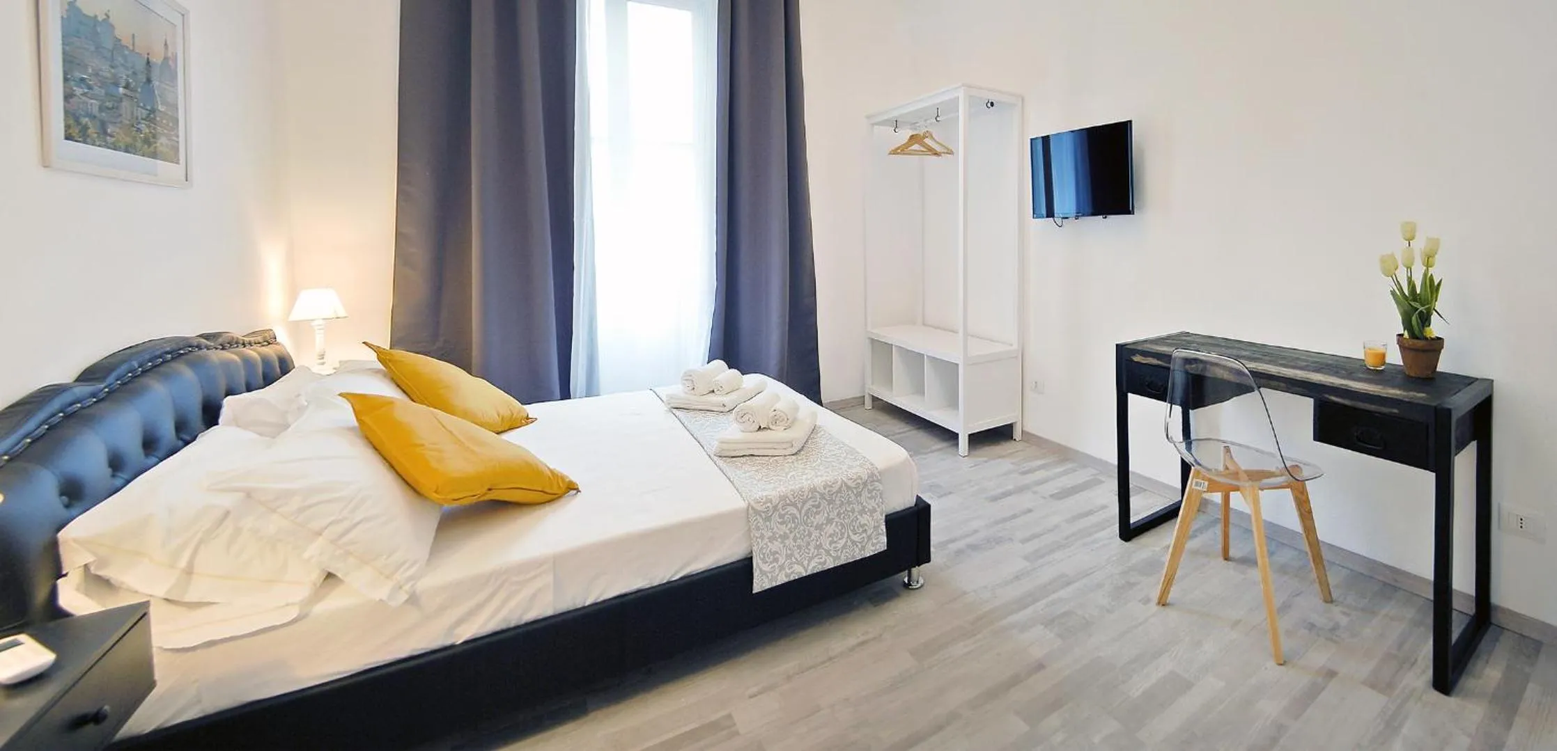 Bed in Pompeo Magno White Luxury Apartment