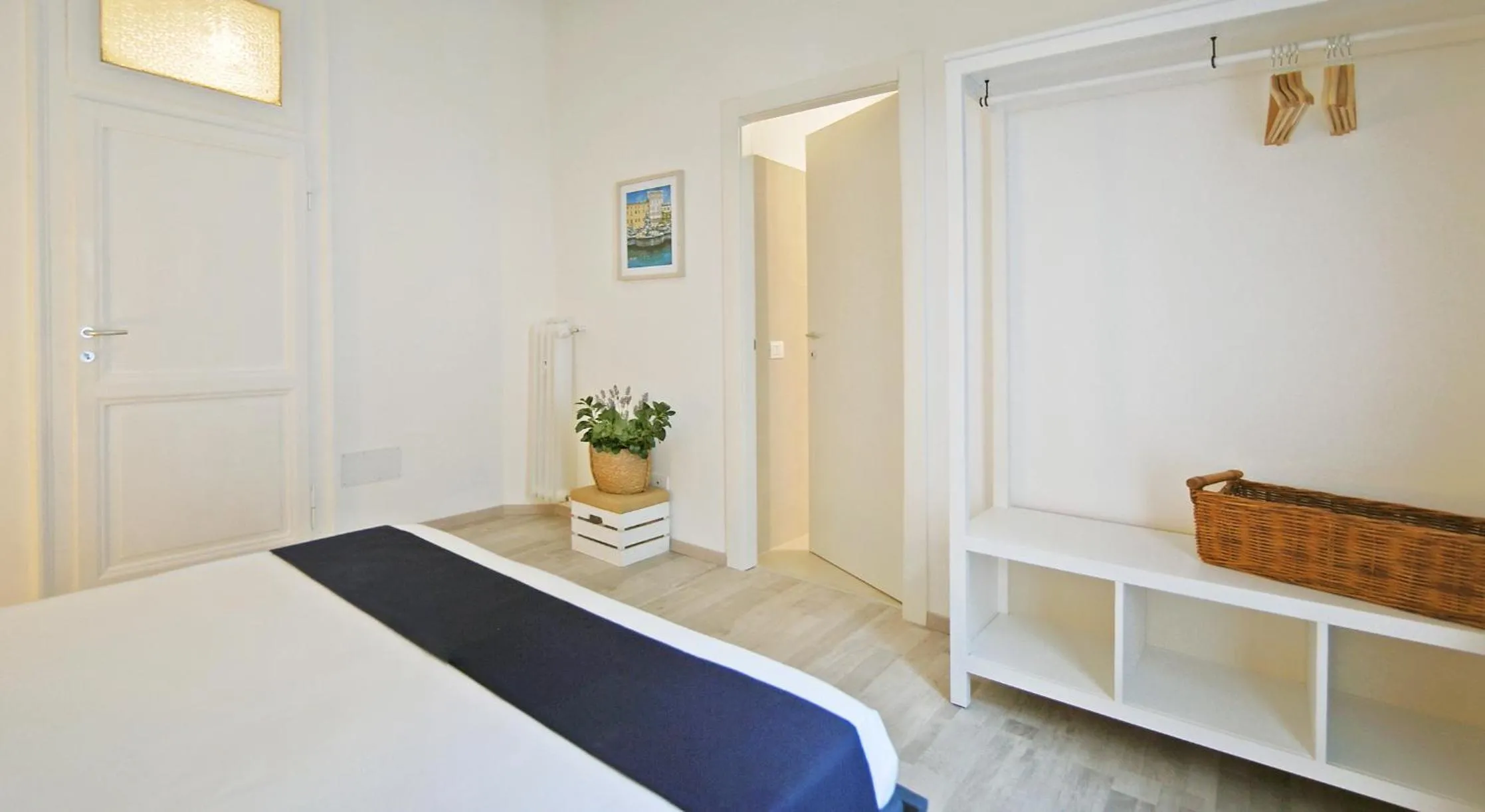 Bed in Pompeo Magno White Luxury Apartment