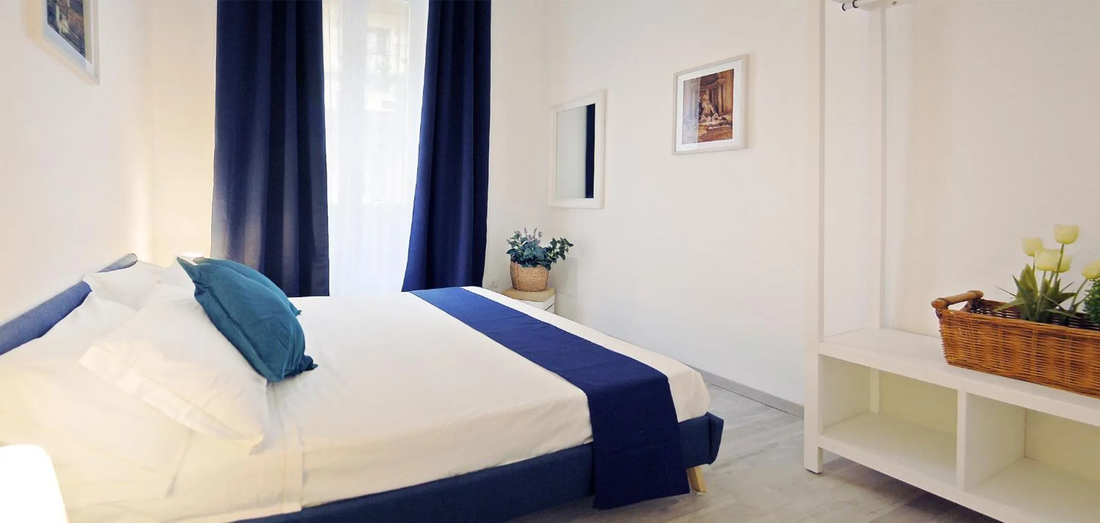 Bed in Pompeo Magno White Luxury Apartment