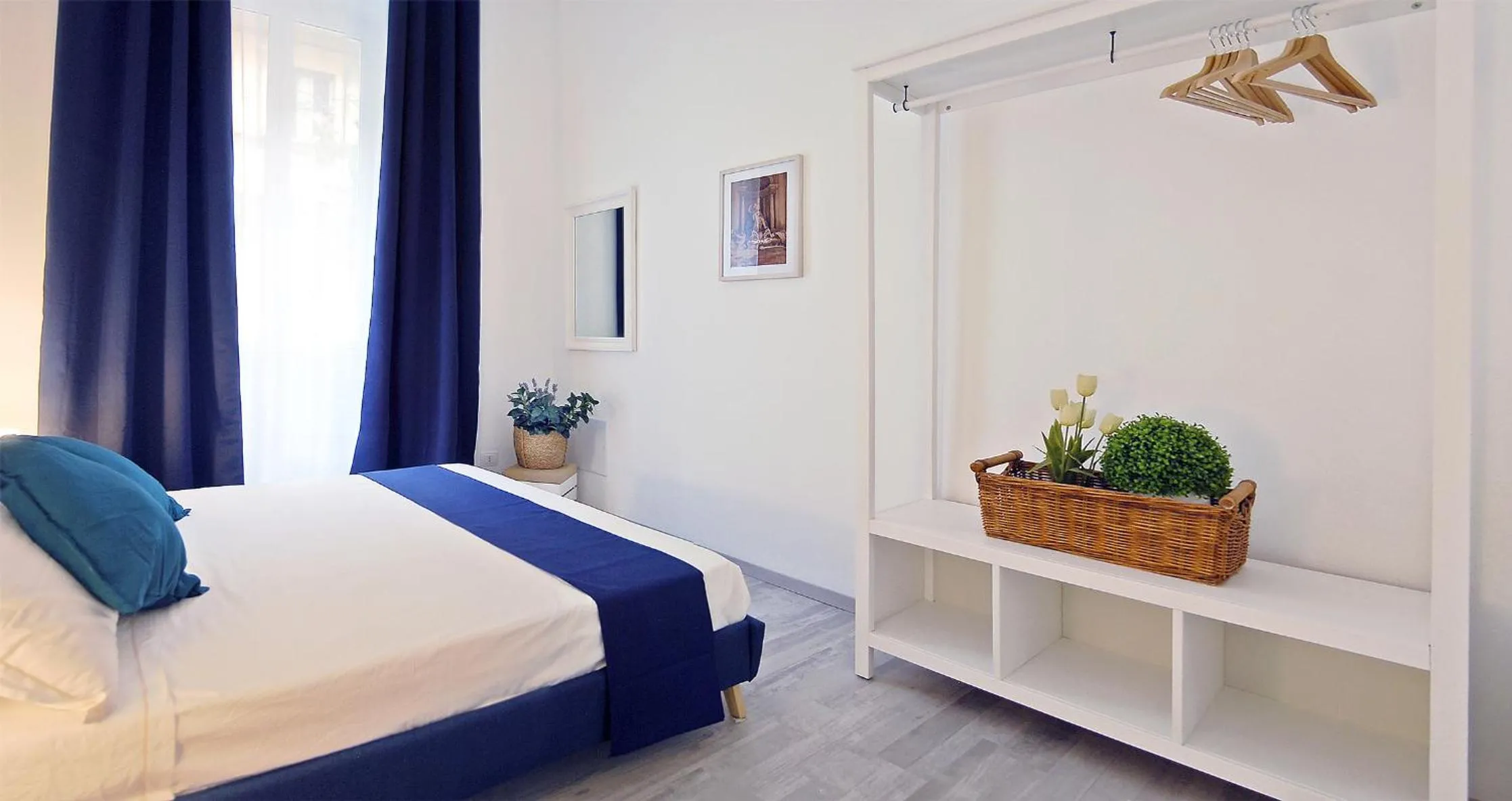 Bed in Pompeo Magno White Luxury Apartment
