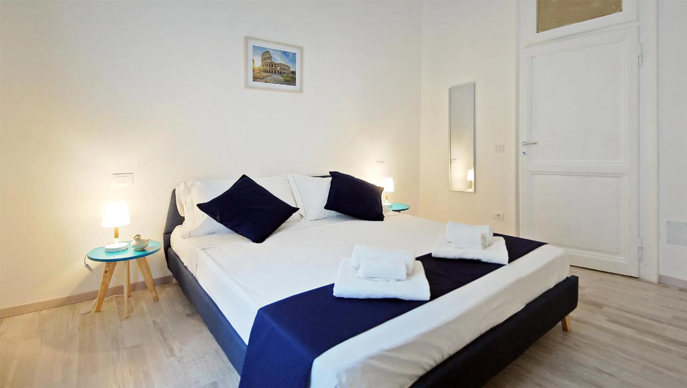 Bed in Pompeo Magno White Luxury Apartment
