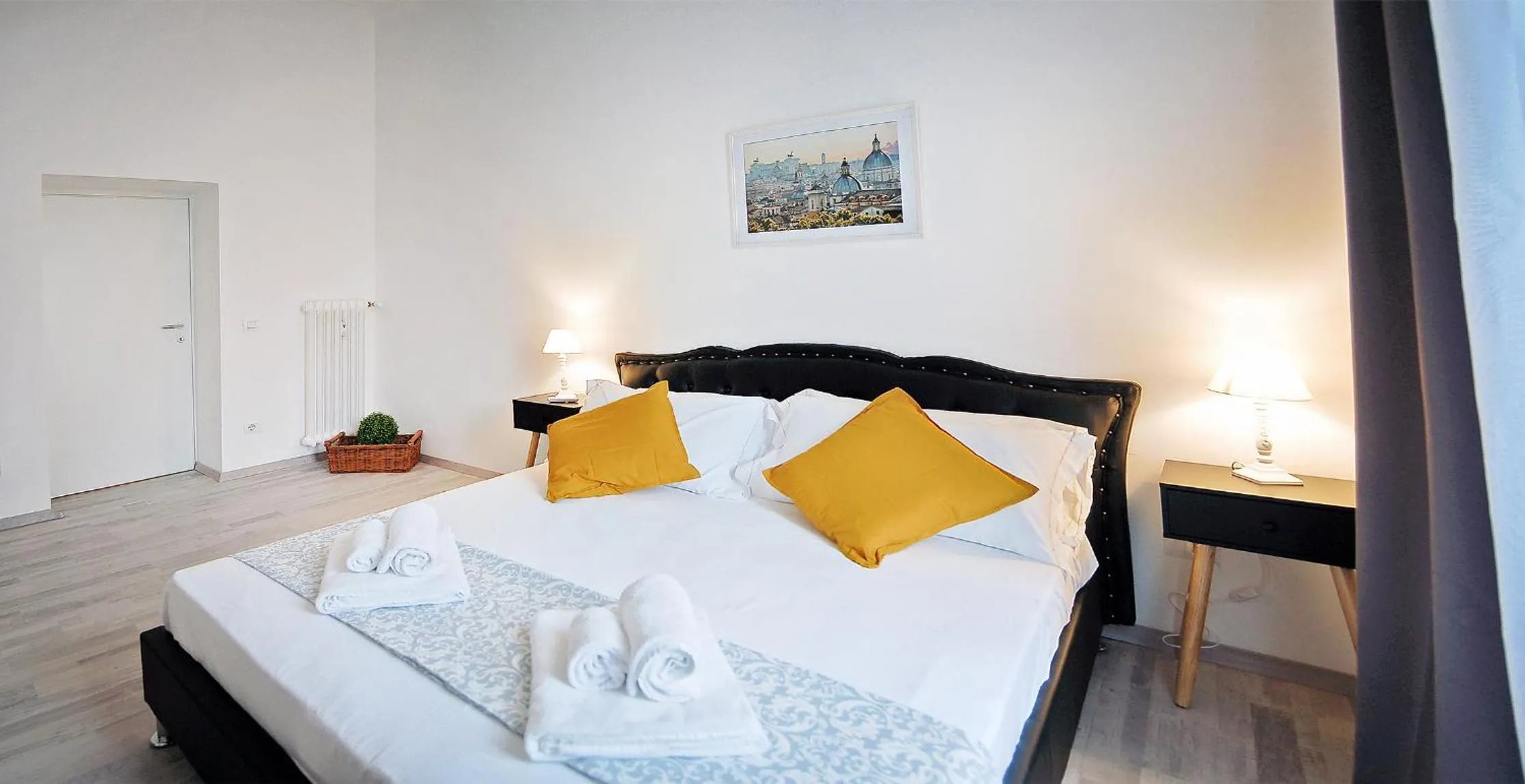 Bed in Pompeo Magno White Luxury Apartment
