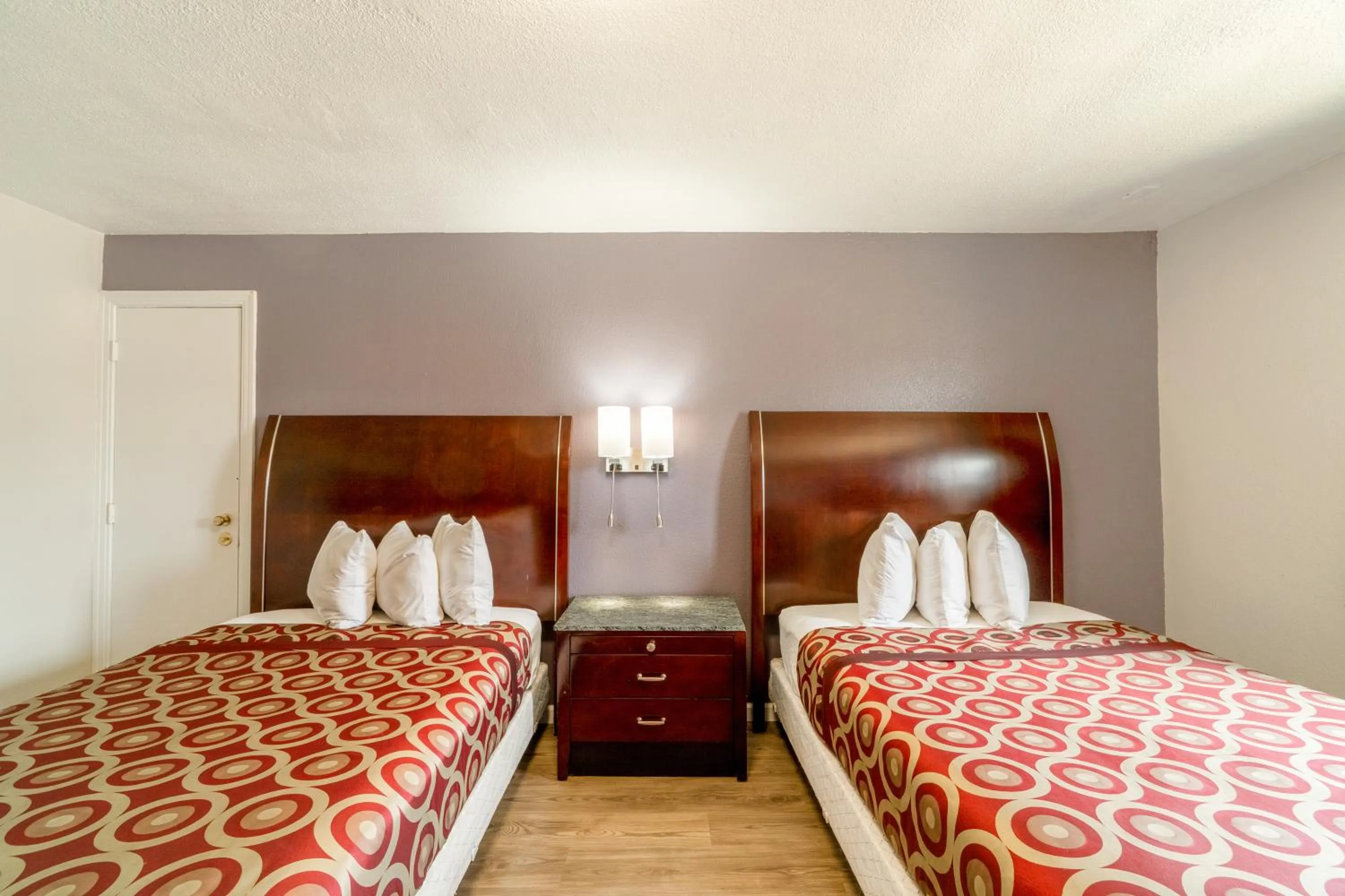 Bedroom, Bed in Economy Inn By OYO, Lamesa TX