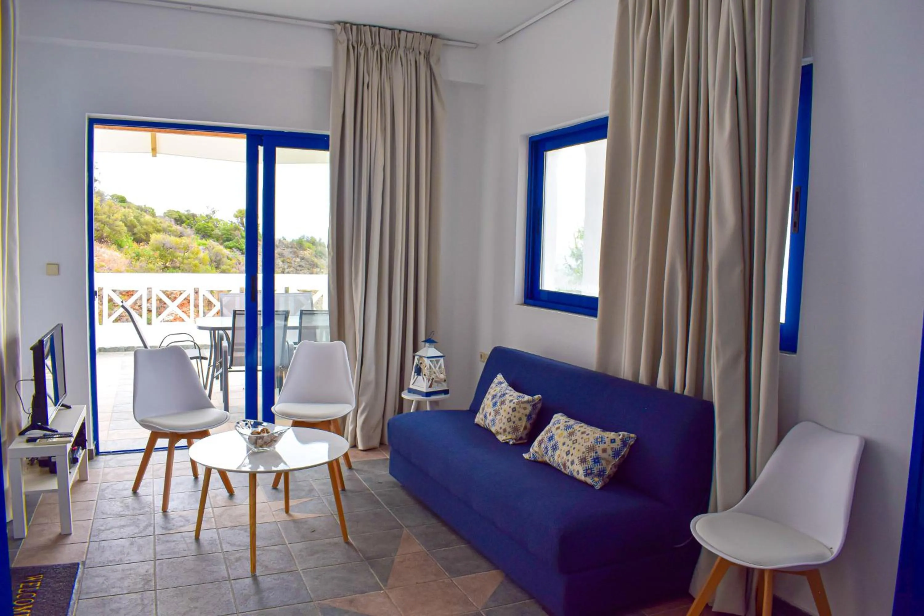 Seating area in Muses seaside Villas