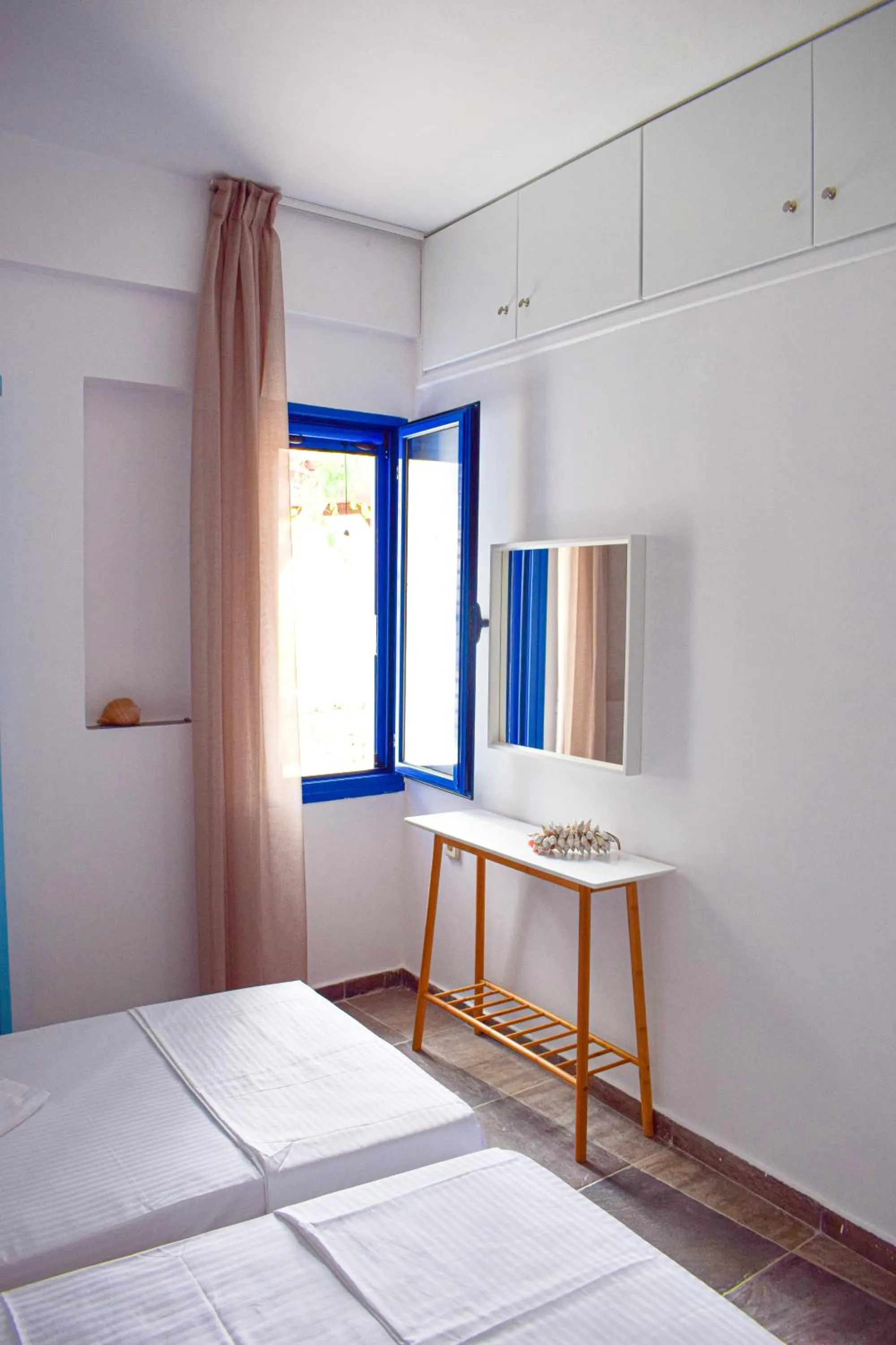 Bed in Muses seaside Villas