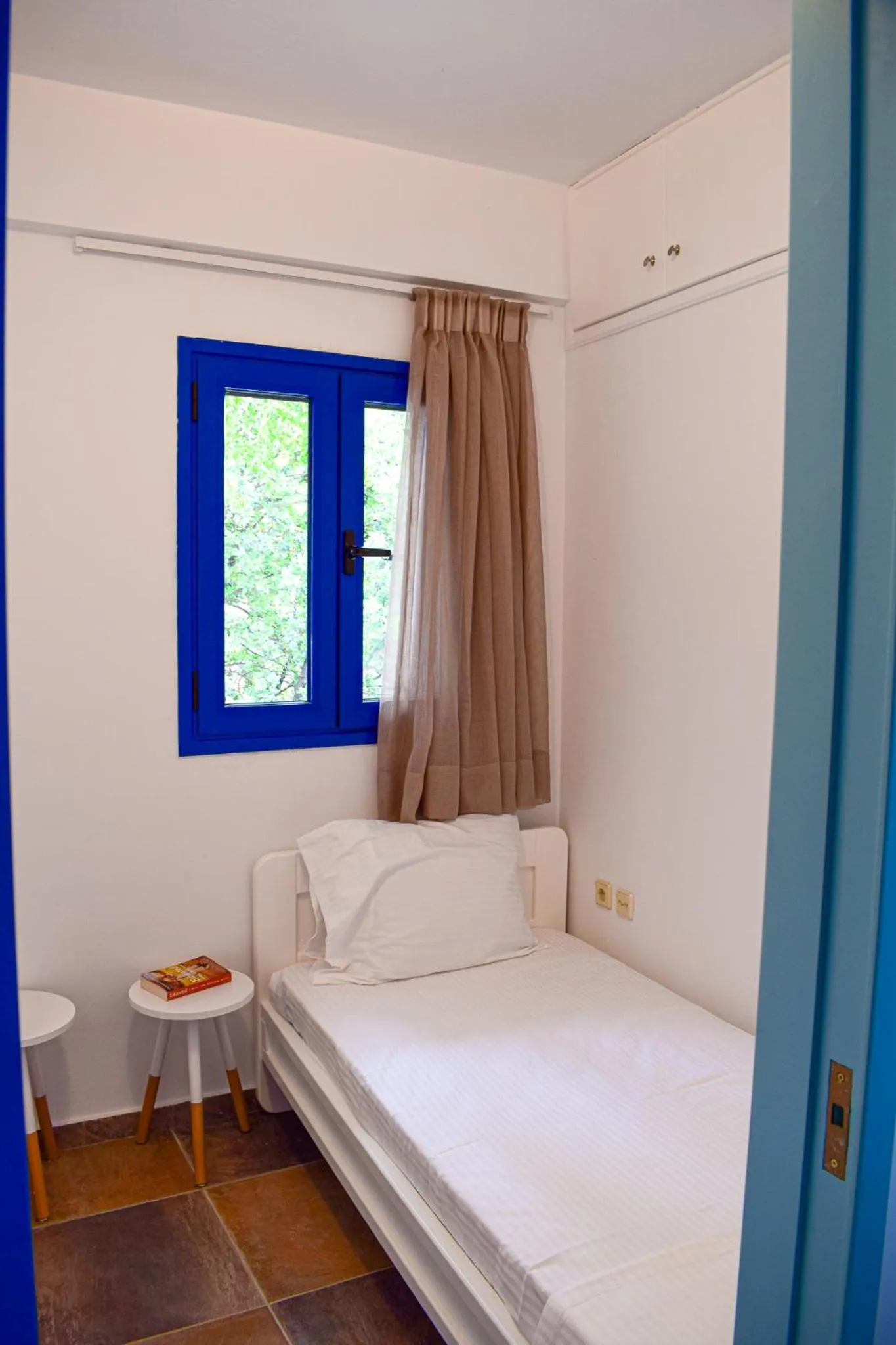 Bed in Muses seaside Villas