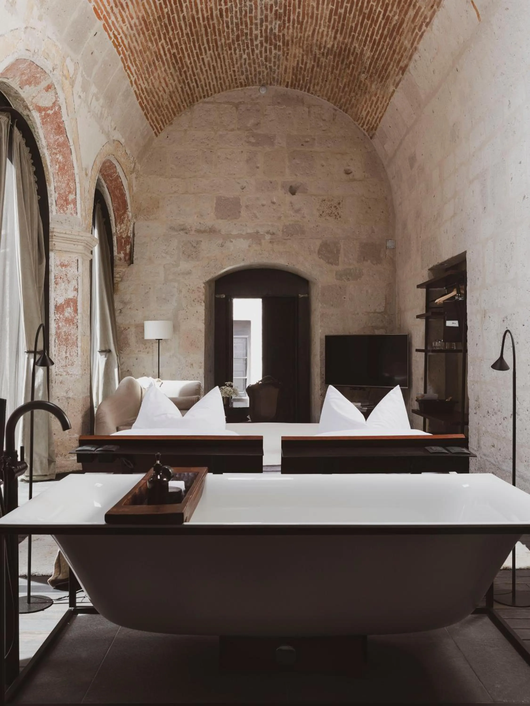 Bed in CIRQA - Relais & Châteaux