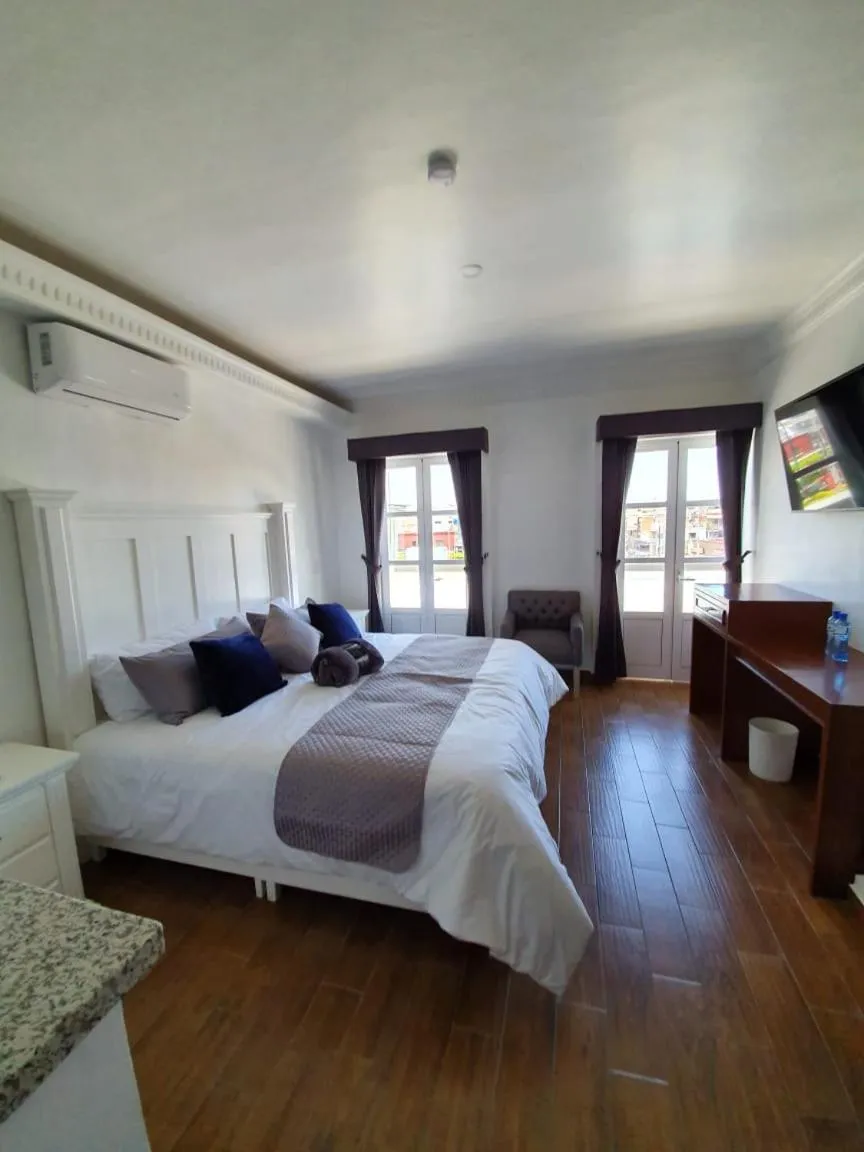 Bed in Hotel Estancia Real