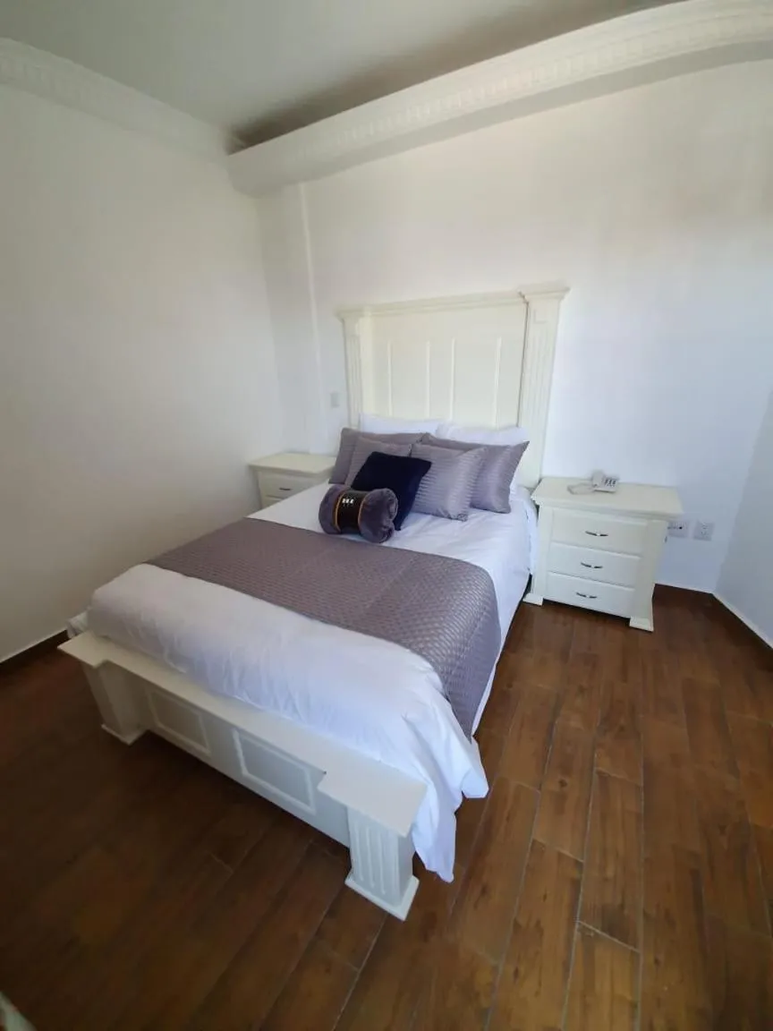 Bed in Hotel Estancia Real